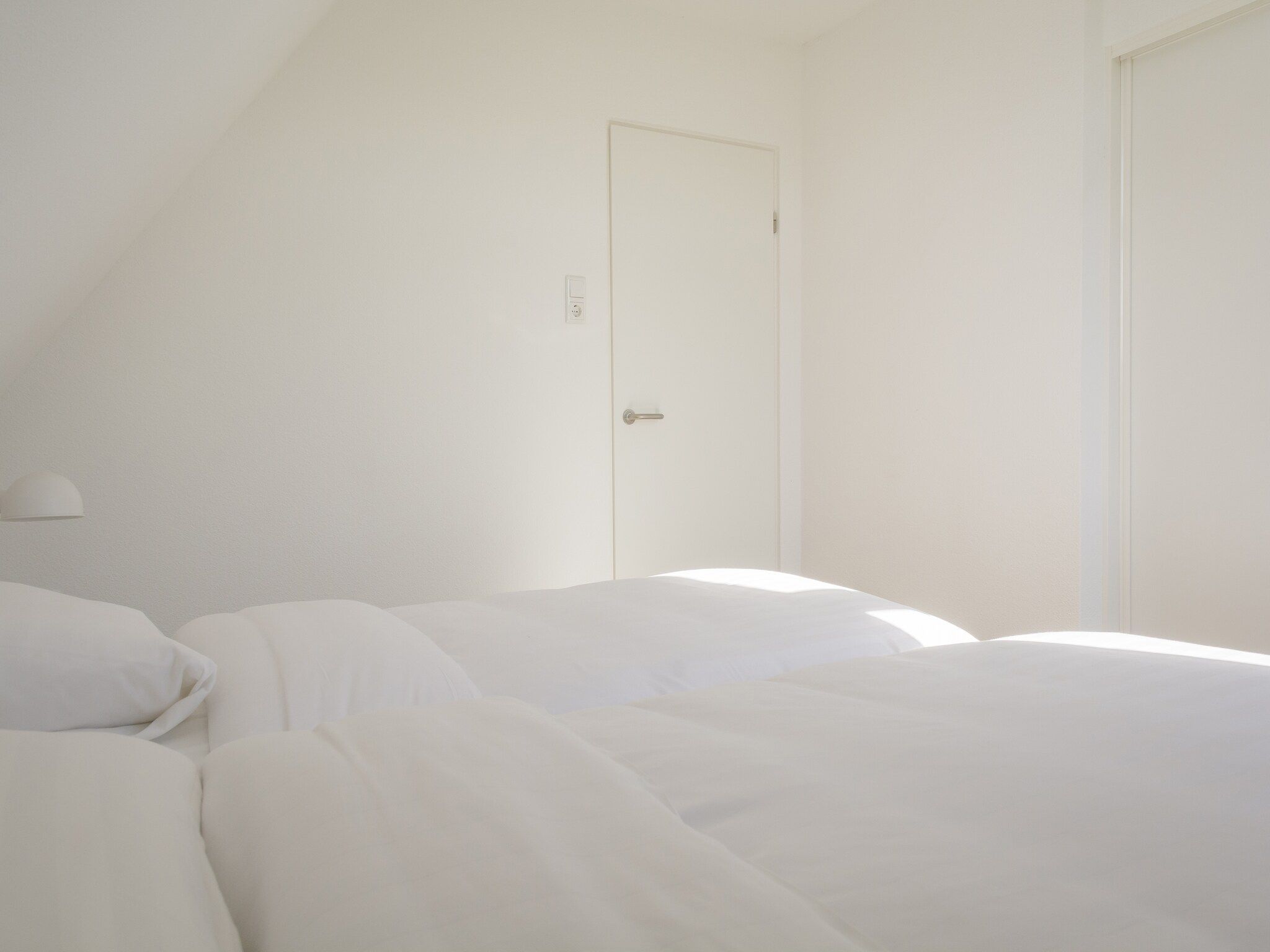 Een slaapkamer van Bouwlust E9 in De Cocksdorp Texel