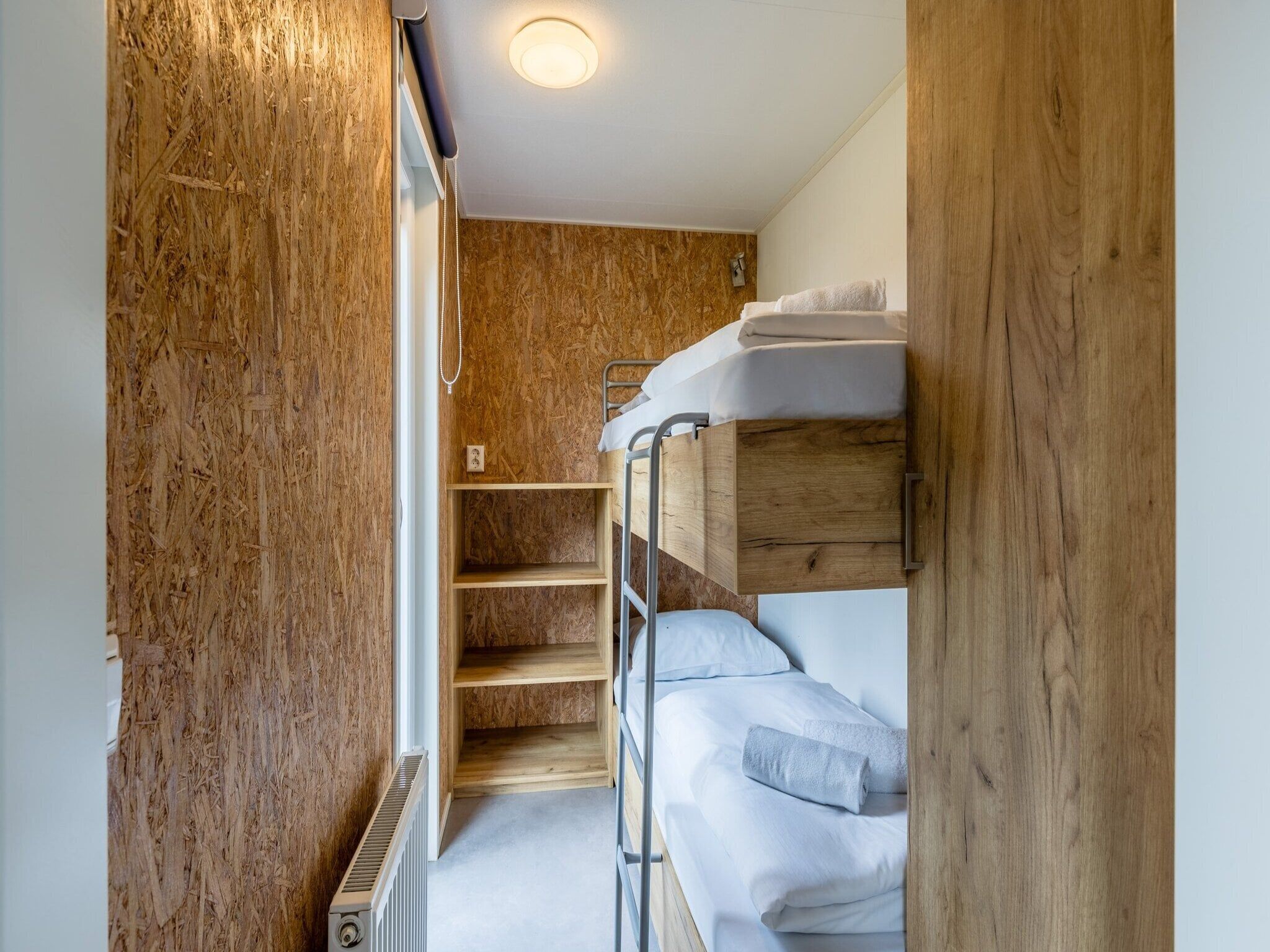 Een slaapkamer van Vakantiepark Beach Resort 7 in Kamperland