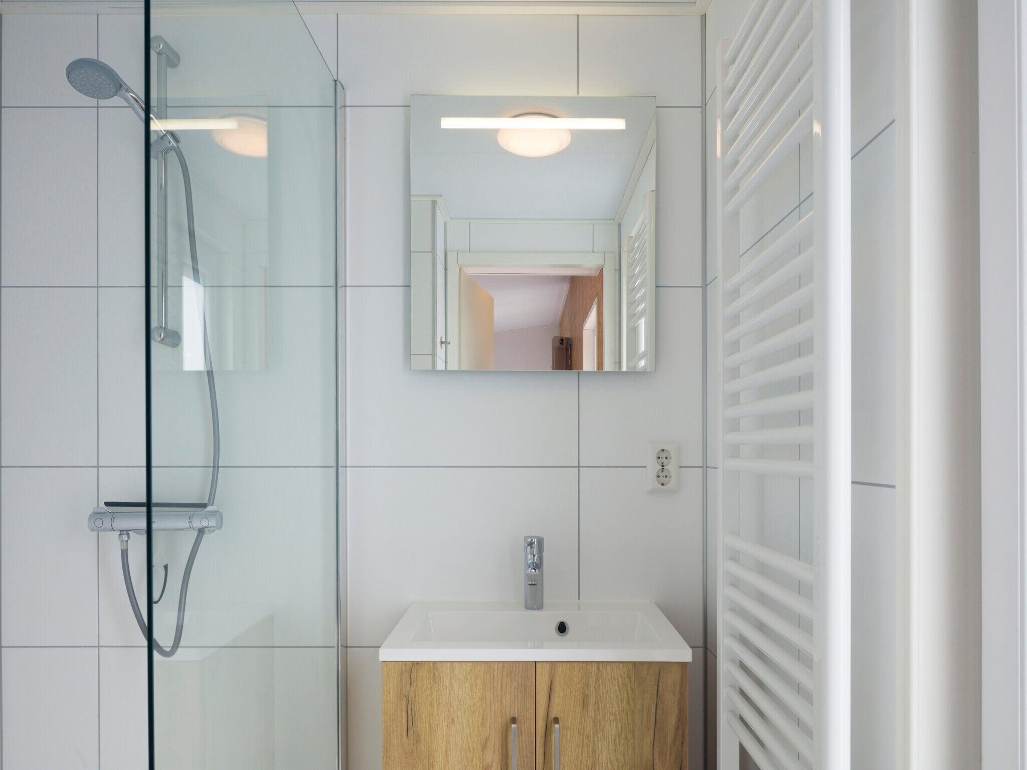 De badkamer van Vakantiepark Beach Resort 7 in Kamperland