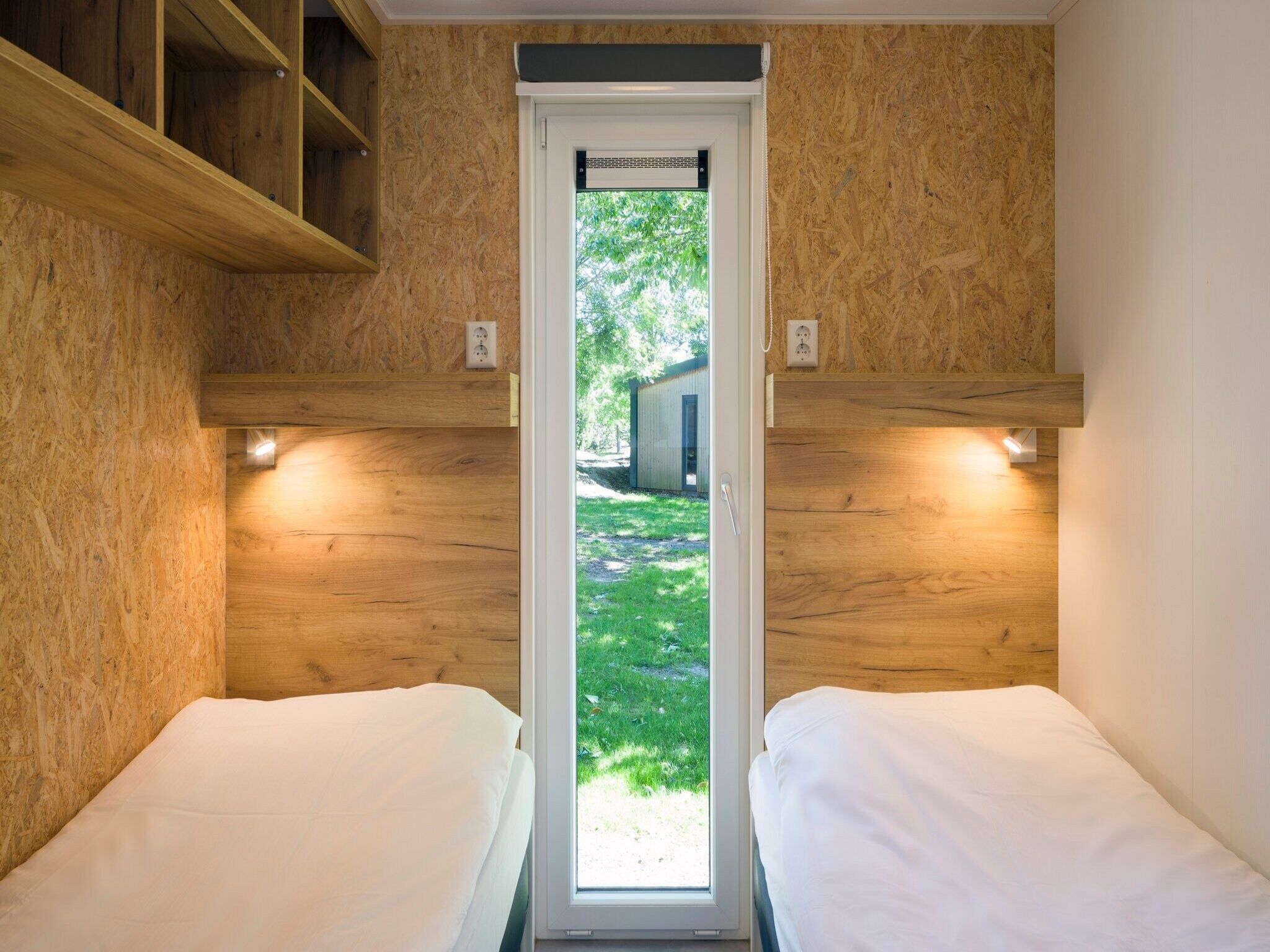 Een slaapkamer van Vakantiepark Beach Resort 7 in Kamperland