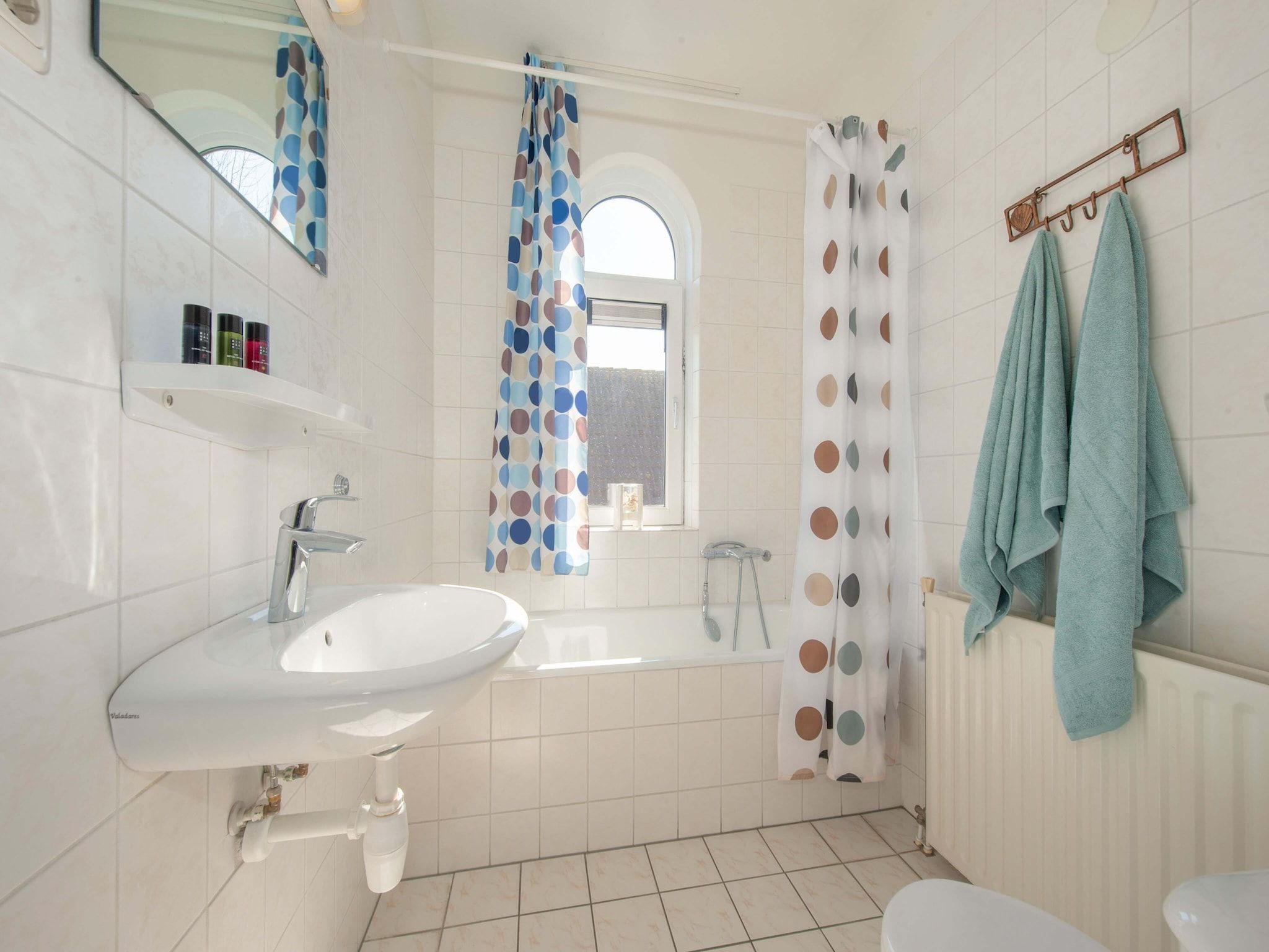 De badkamer van Noordzee Résidence De Banjaard 12 in Kamperland