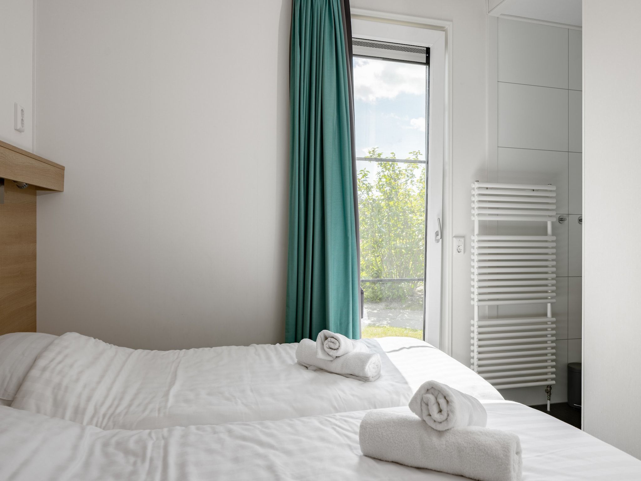 Een slaapkamer van Vakantiepark Zeebad 7 in Breskens