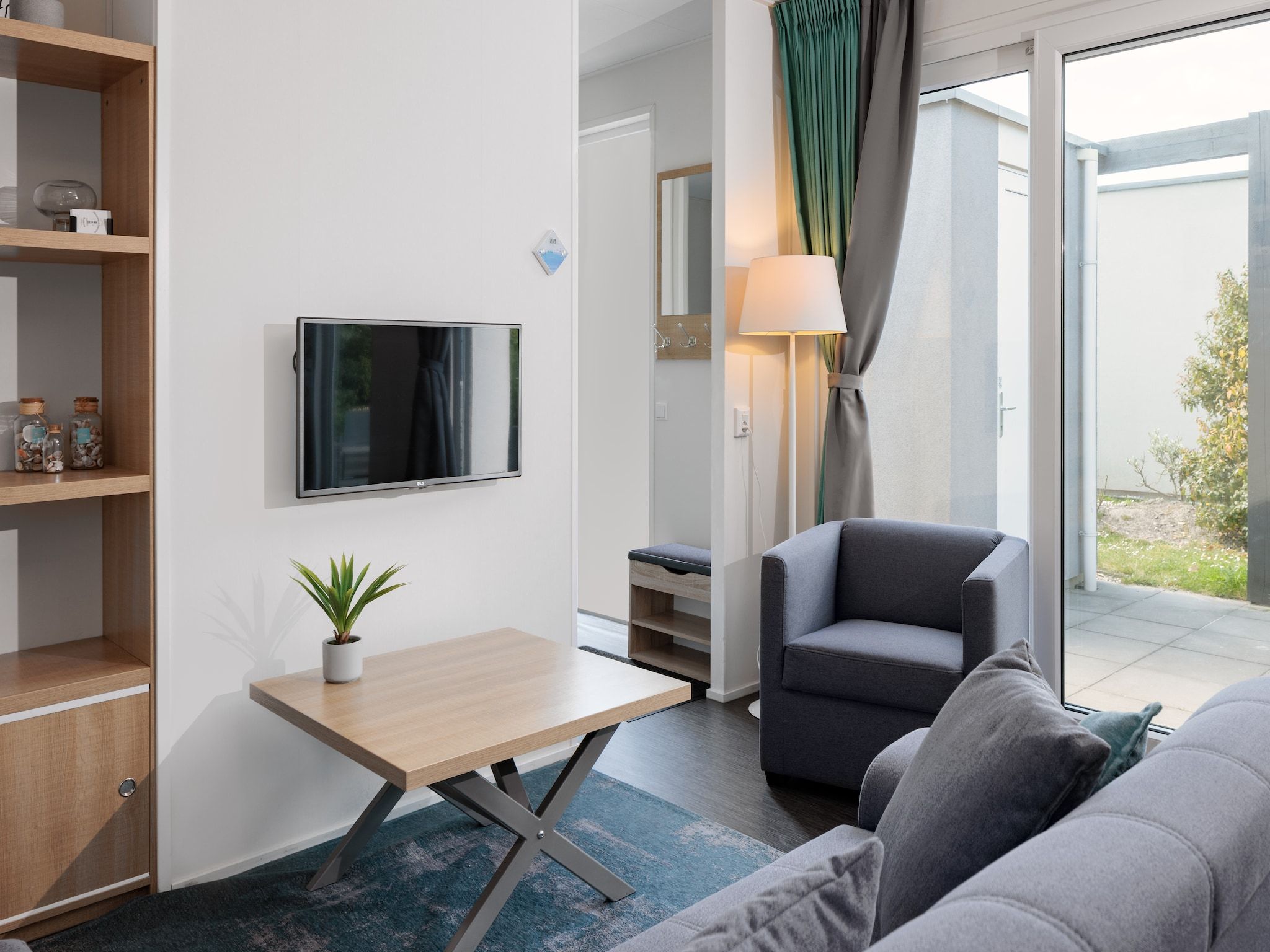 De woonkamer van Vakantiepark Zeebad 7 in Breskens