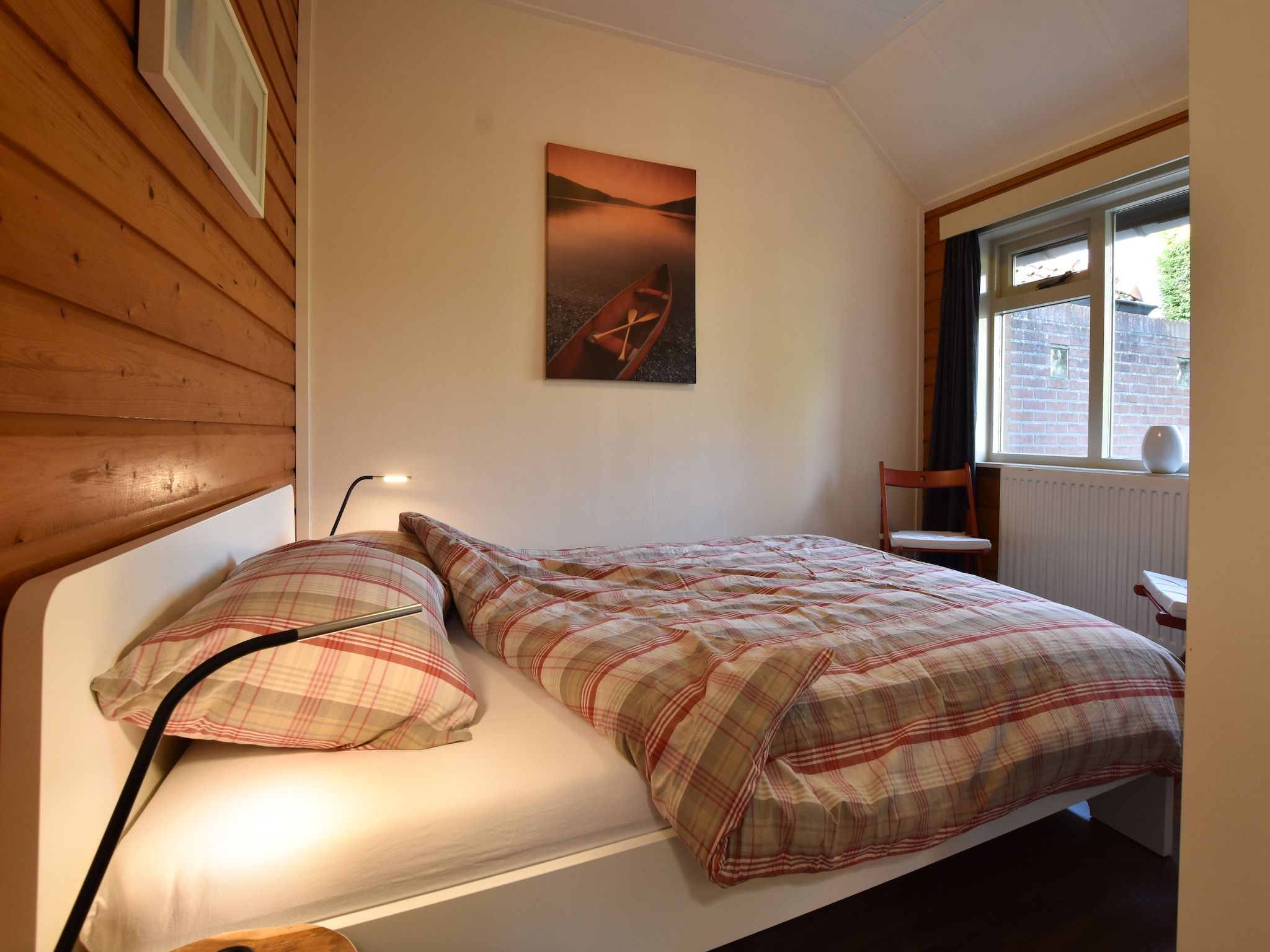 Een slaapkamer van Veluwse Mus in Garderen