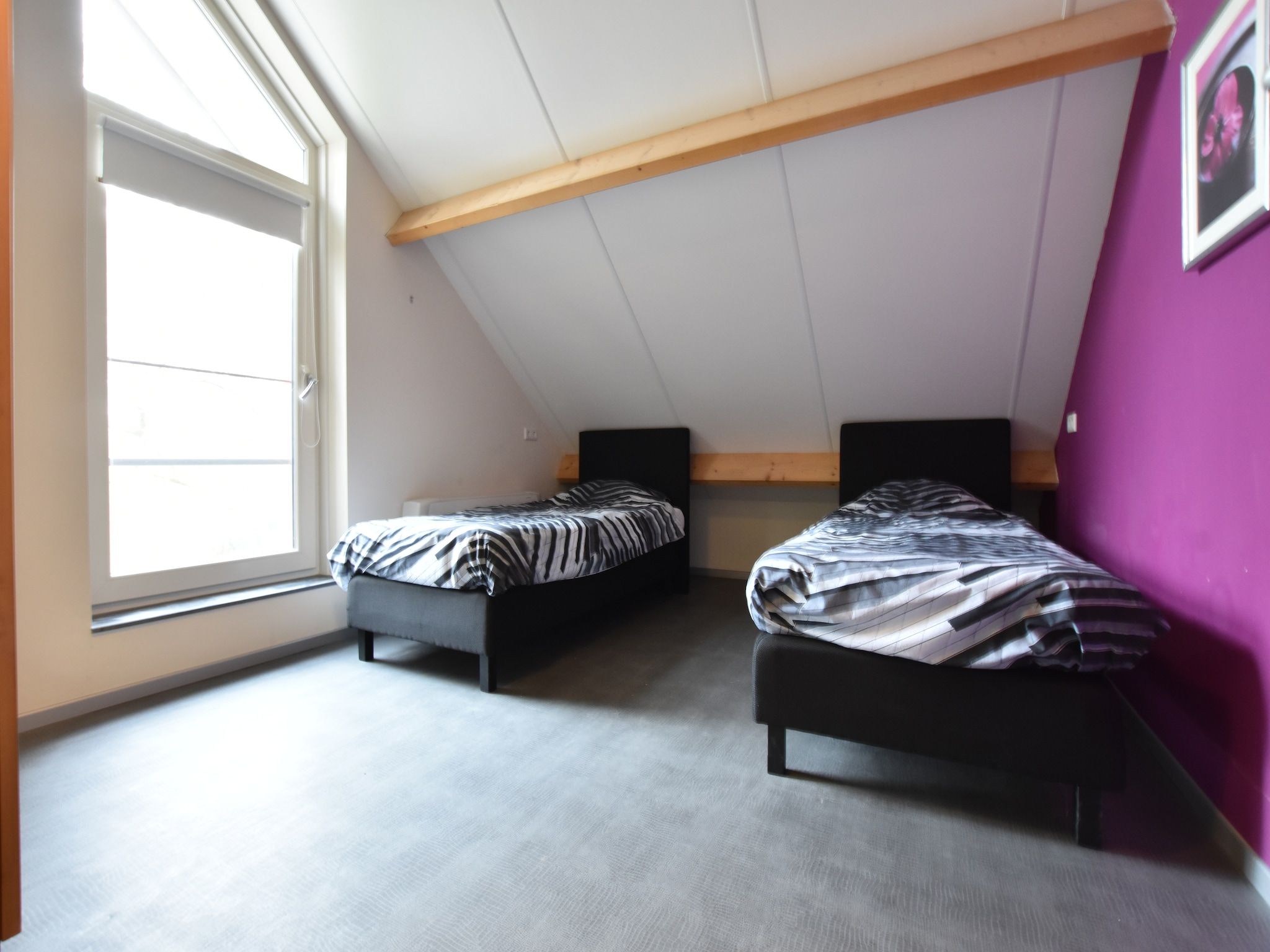 Een slaapkamer van Villa Luttenberg in Luttenberg