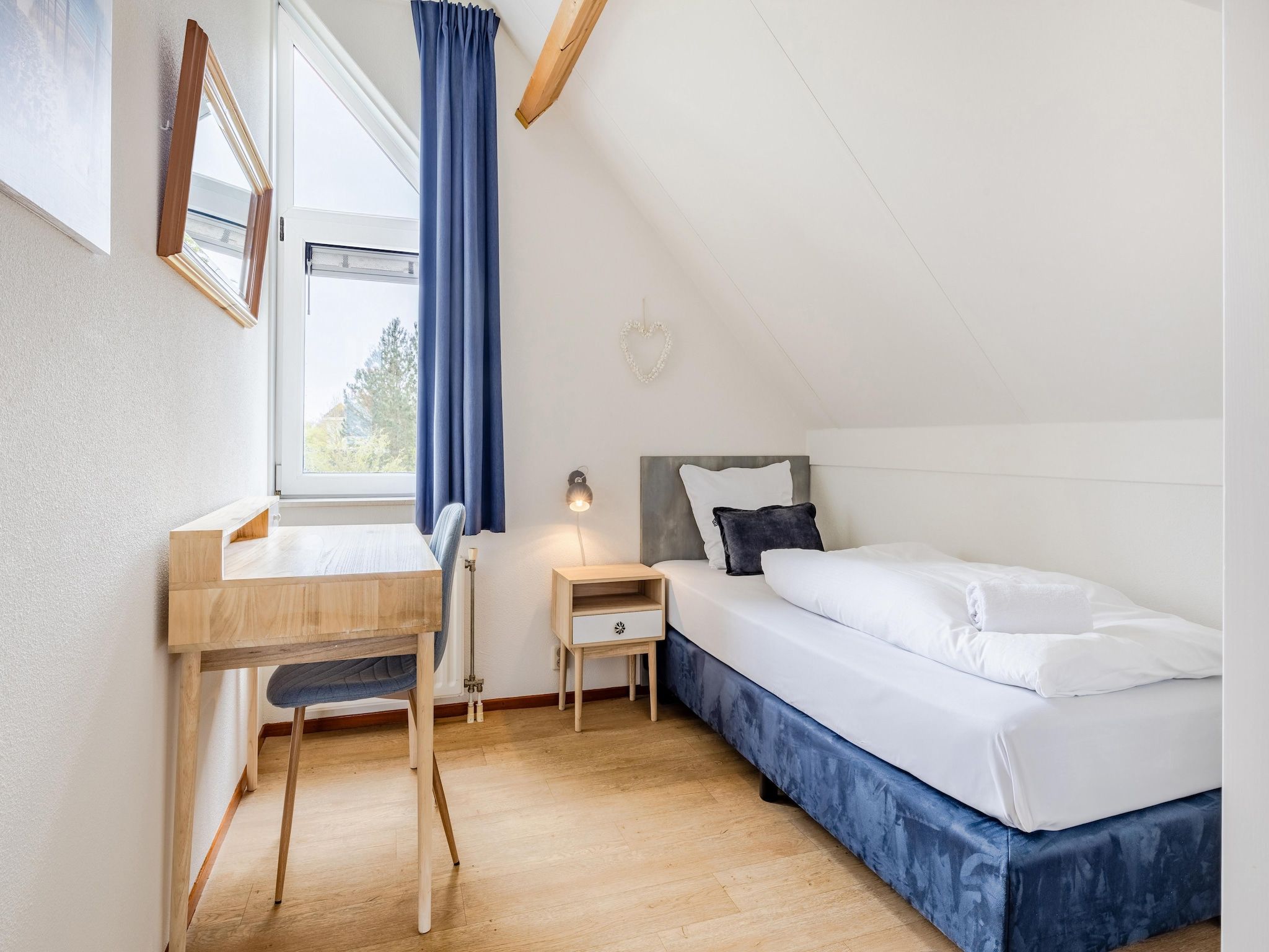 Een slaapkamer van Noordzee Résidence De Banjaard 13 in Kamperland