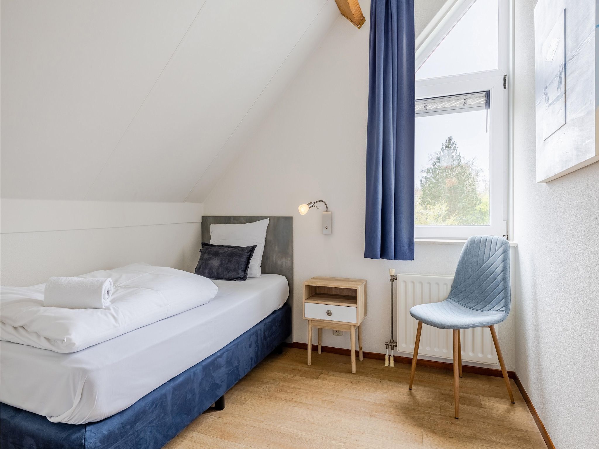 Een slaapkamer van Noordzee Résidence De Banjaard 13 in Kamperland