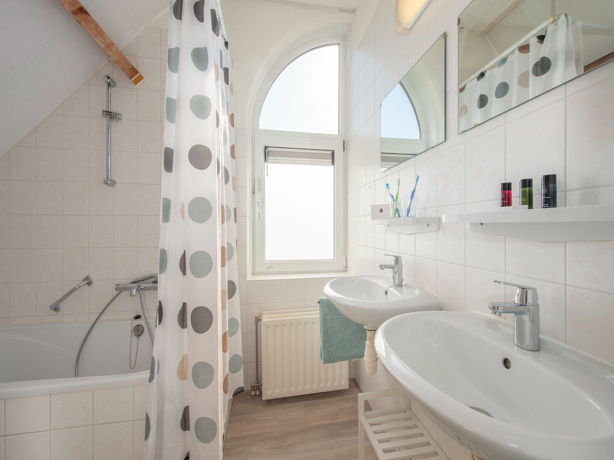 De badkamer van Noordzee Résidence De Banjaard 14 in Kamperland