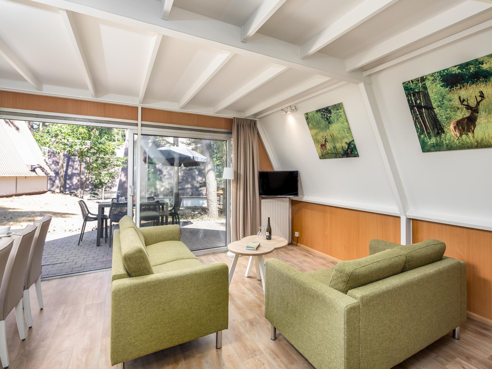 De woonkamer van Bospark 't Wolfsven 8 in Mierlo