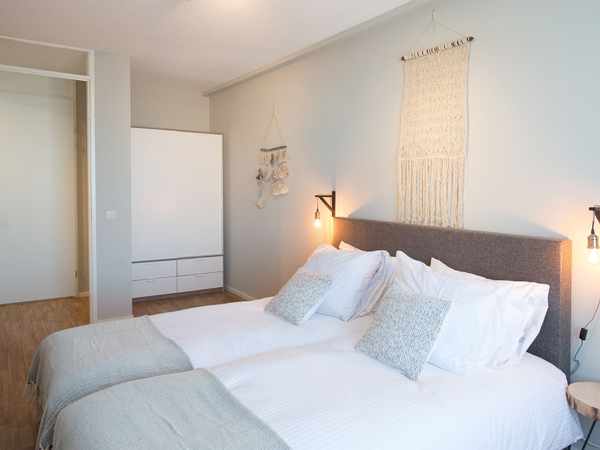 Een slaapkamer van Scheveningen Harbour 66 in Scheveningen