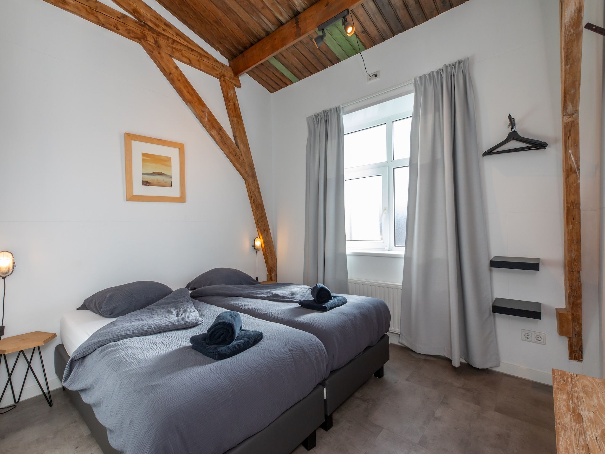 Een slaapkamer van Pleinzicht 6c in Koudekerke