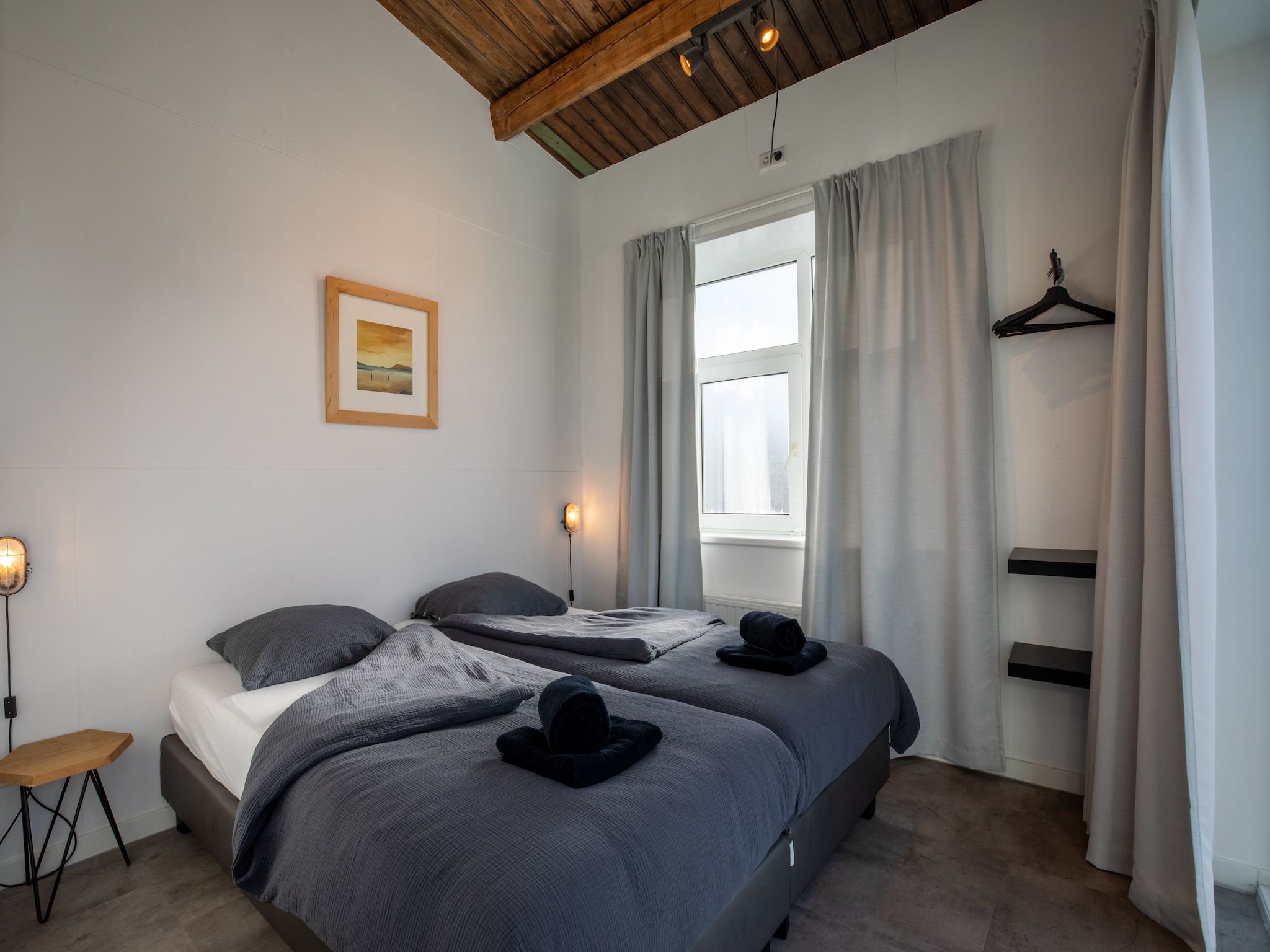 Een slaapkamer van Pleinzicht 6c in Koudekerke