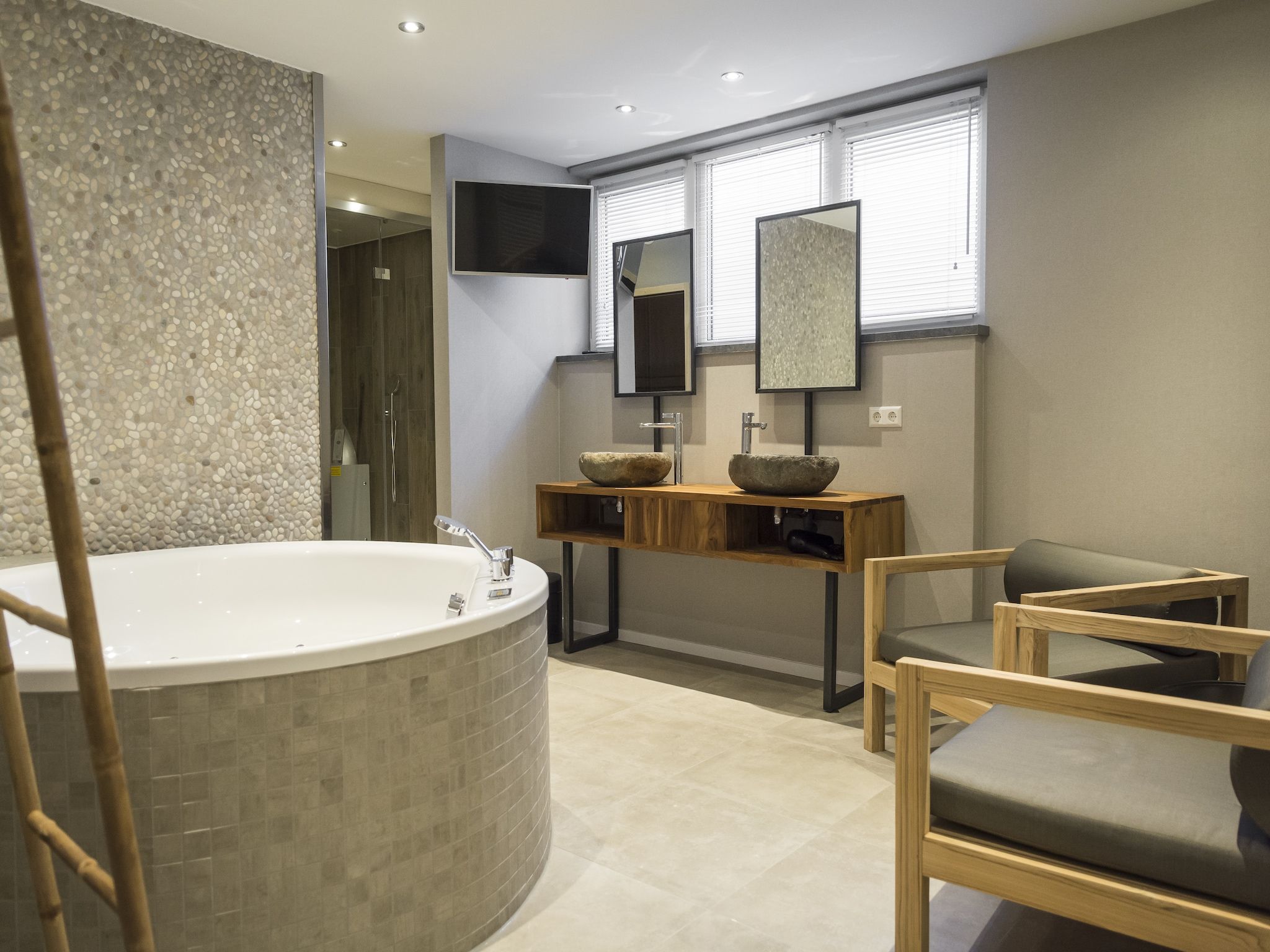 De badkamer van Villa Bouwlust F Wellness in De Cocksdorp Texel