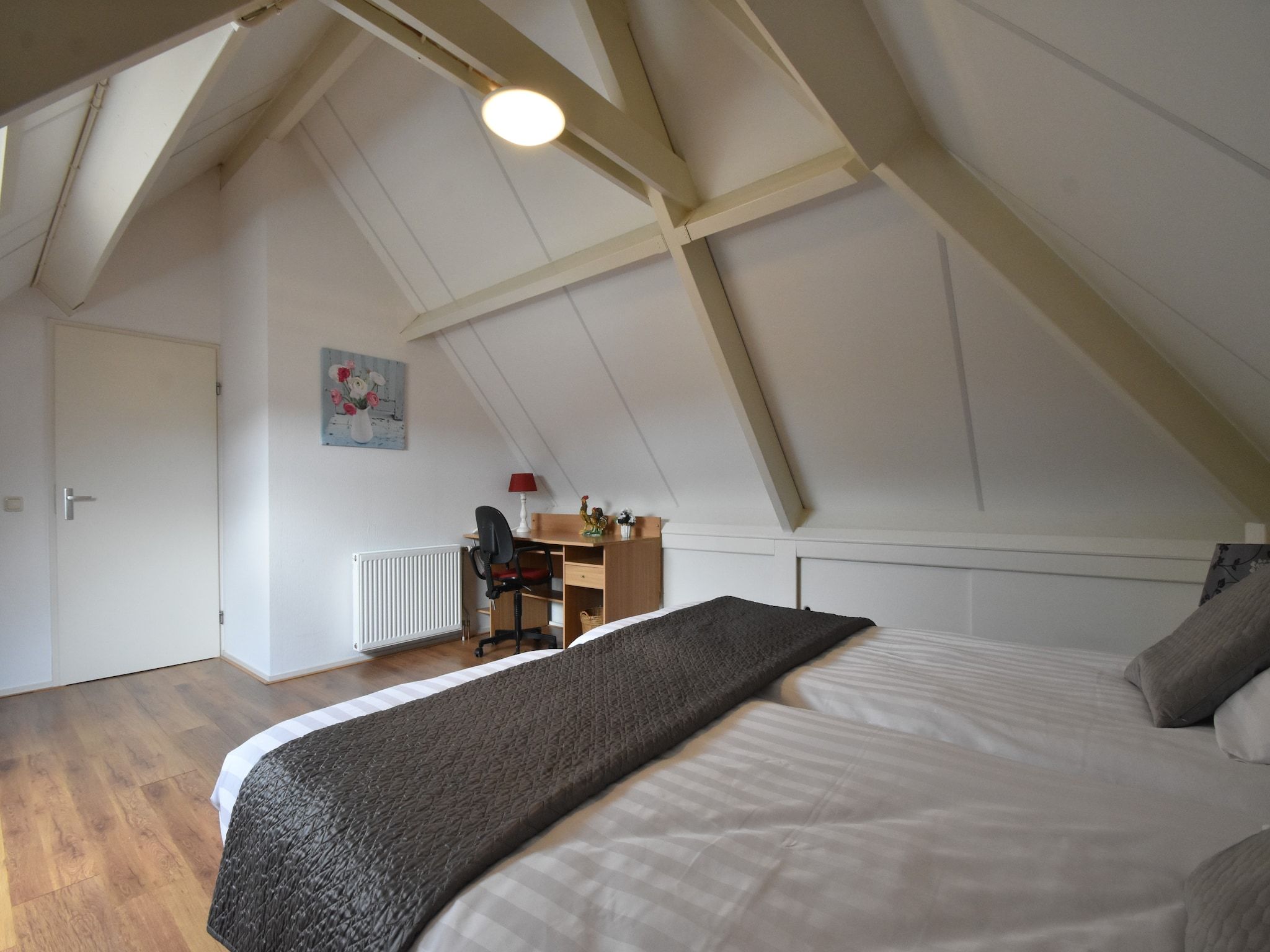 Een slaapkamer van Bosruiter in Zeewolde