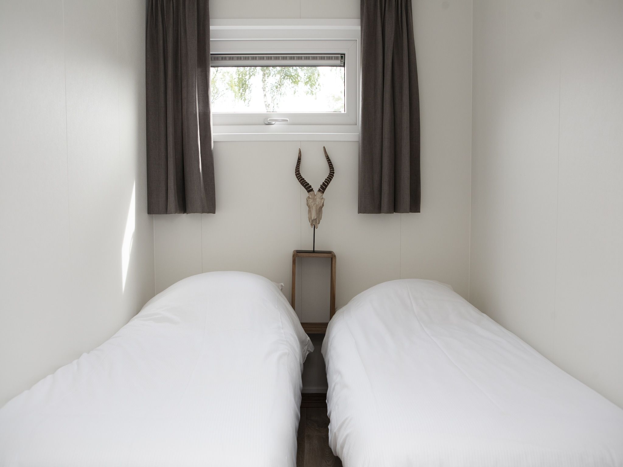 Een slaapkamer van Recreatiepark de Boshoek 21 in Voorthuizen