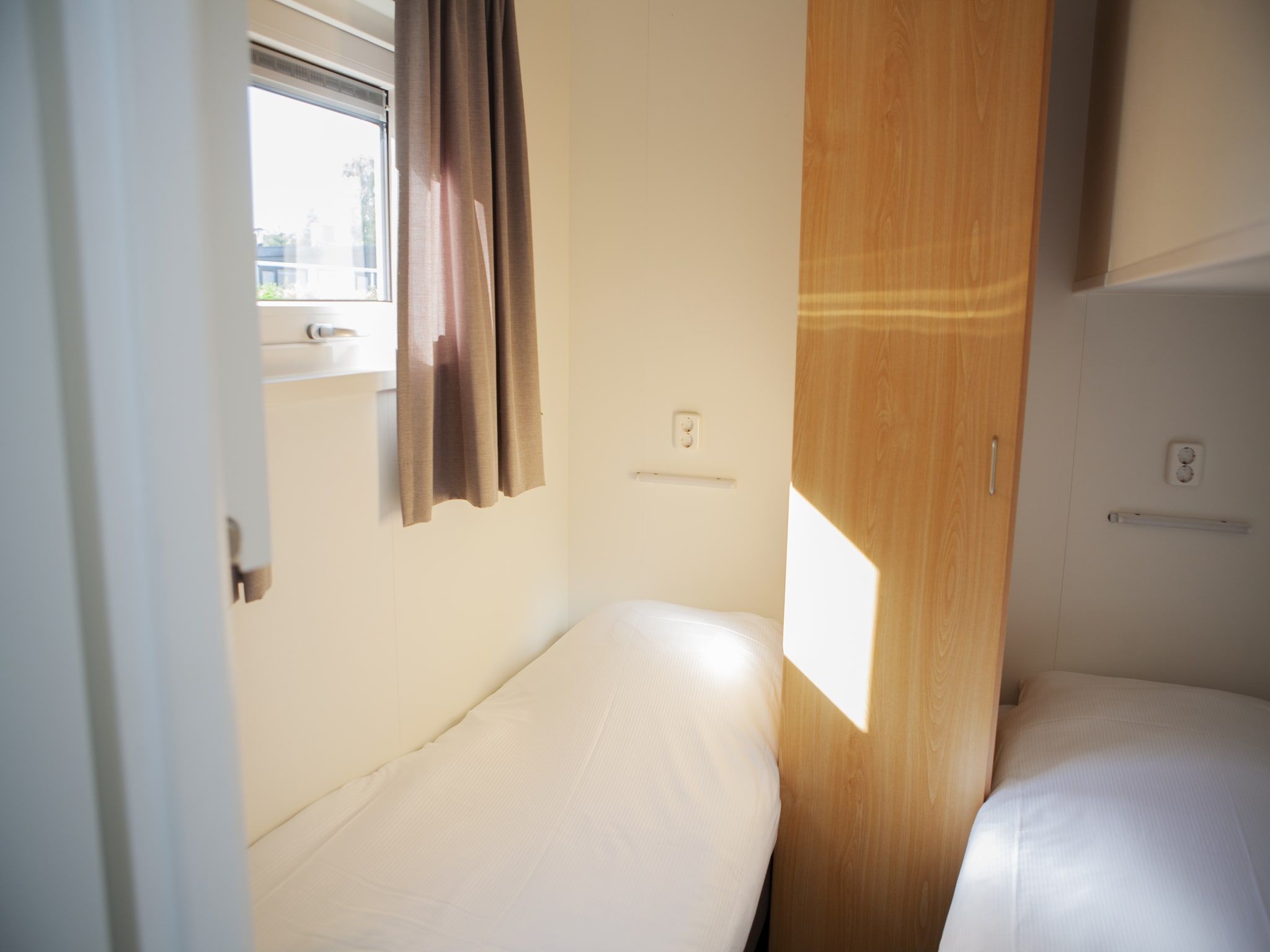 Een slaapkamer van Recreatiepark de Boshoek 22 in Voorthuizen