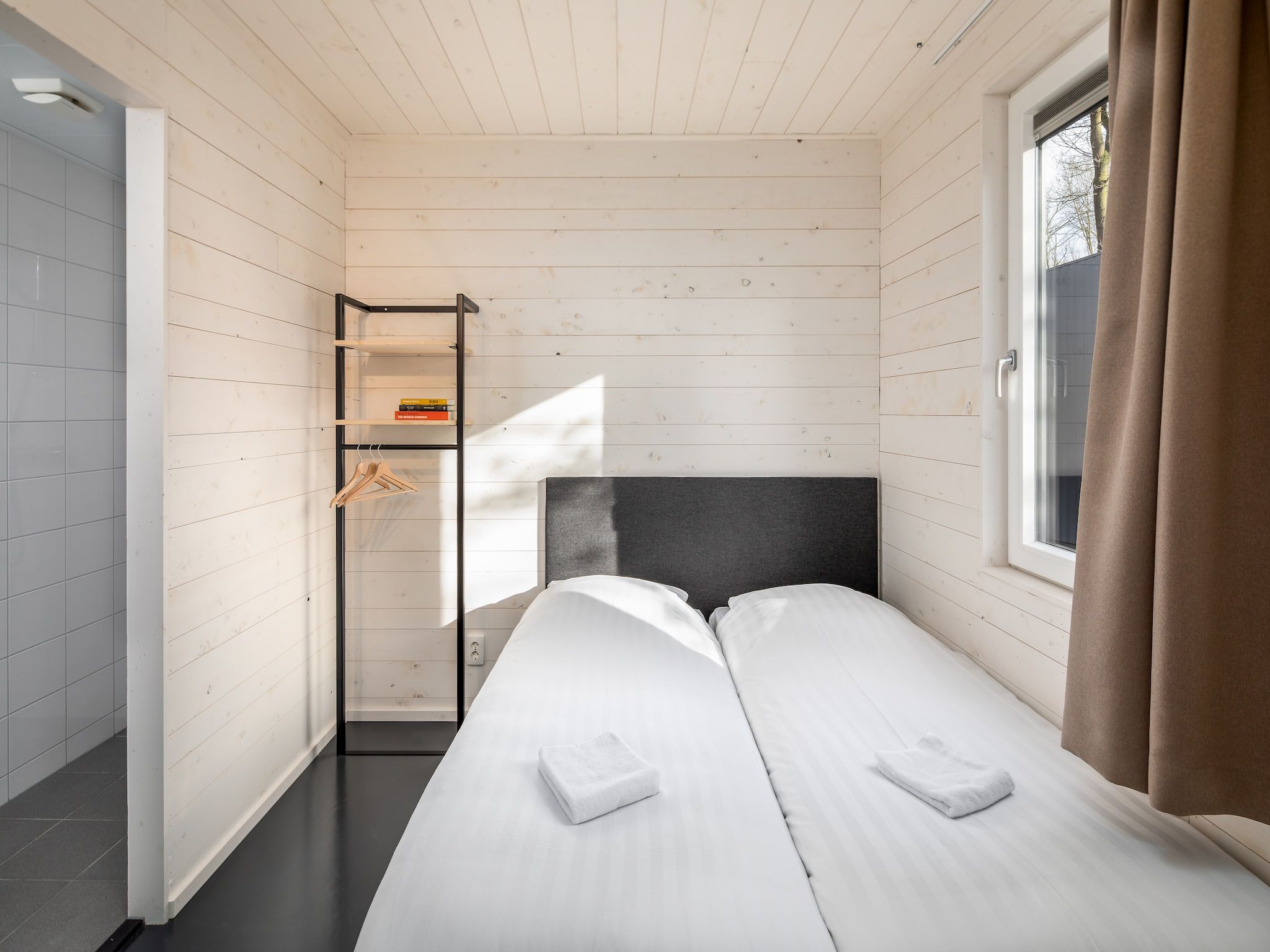 Een slaapkamer van Vakantiepark Schaijk 2 in Schaijk
