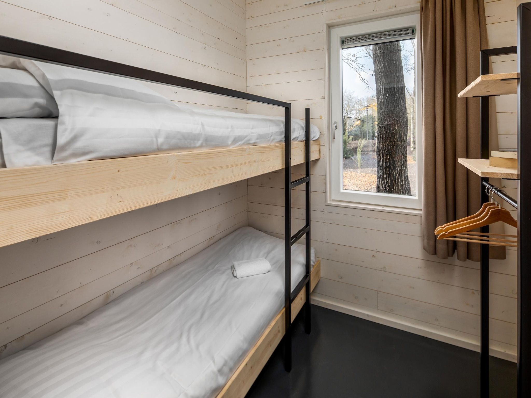 Een slaapkamer van Vakantiepark Schaijk 2 in Schaijk
