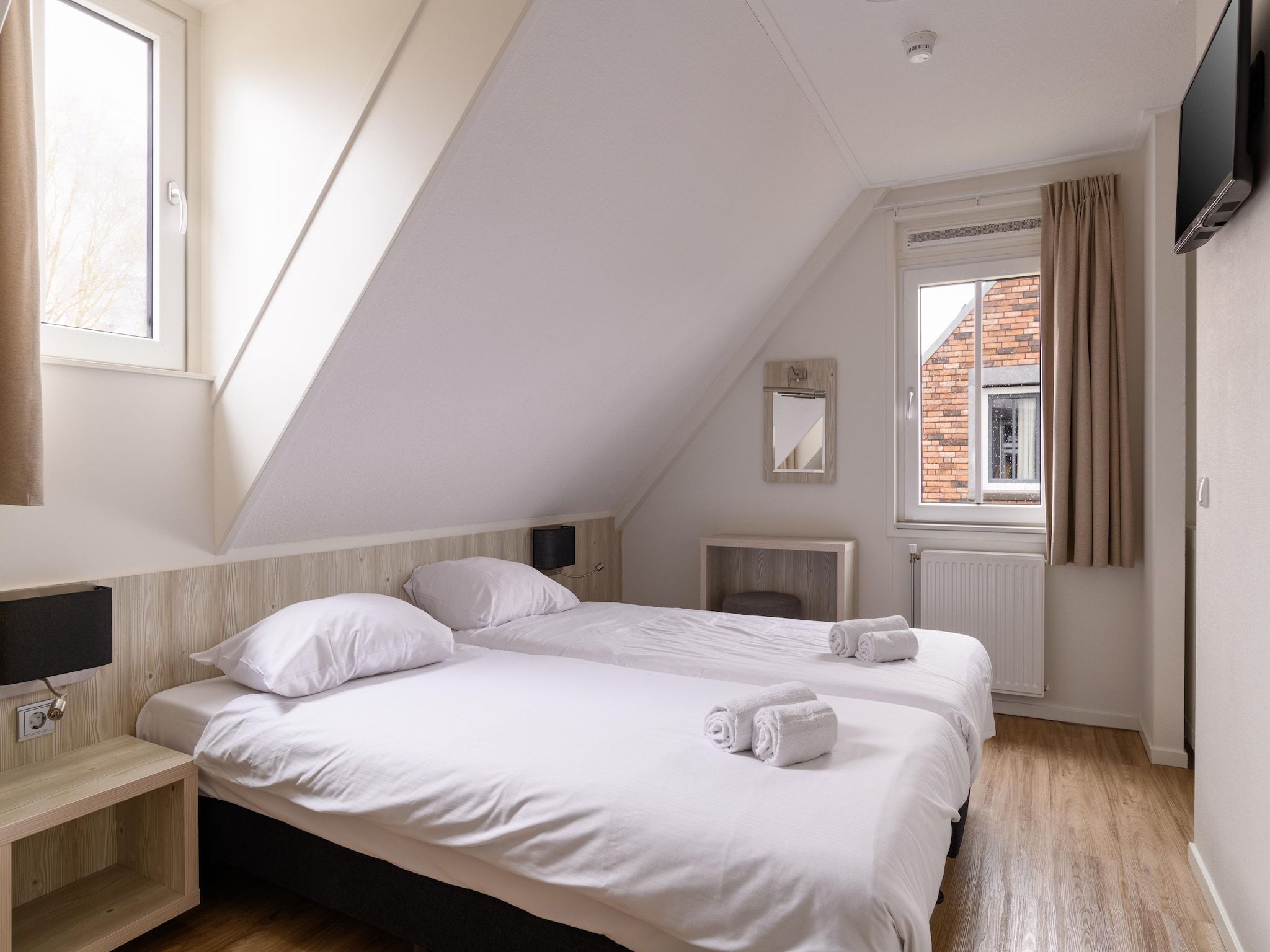 Een slaapkamer van Resort Maastricht 11 in Maastricht