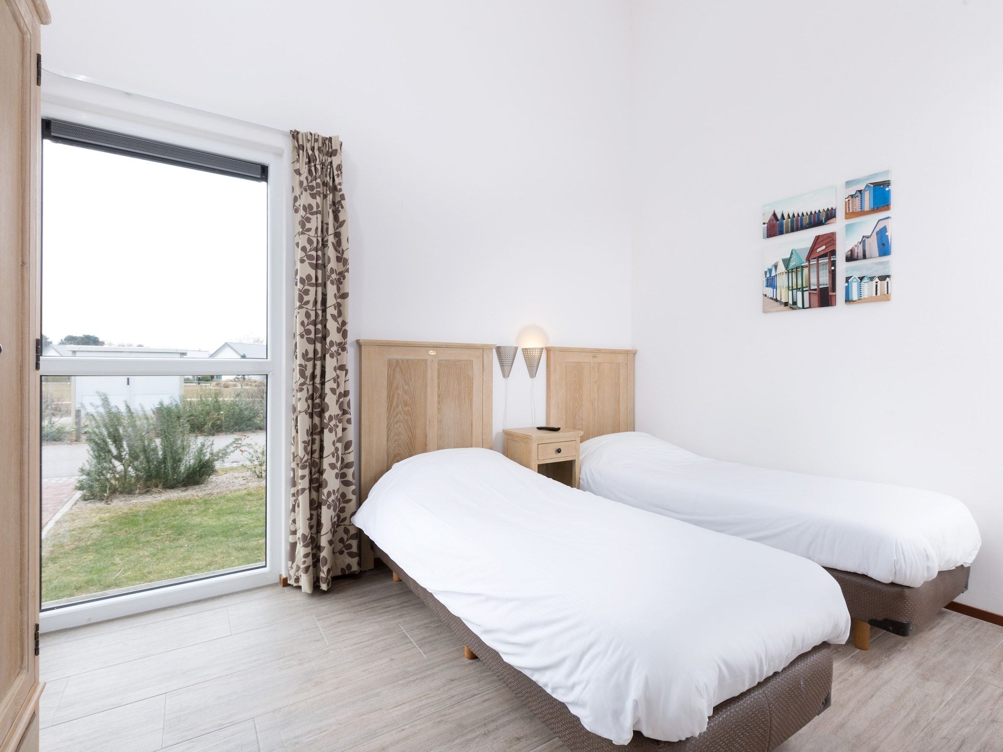 Een slaapkamer van Strandpark Duynhille 1 in Ouddorp