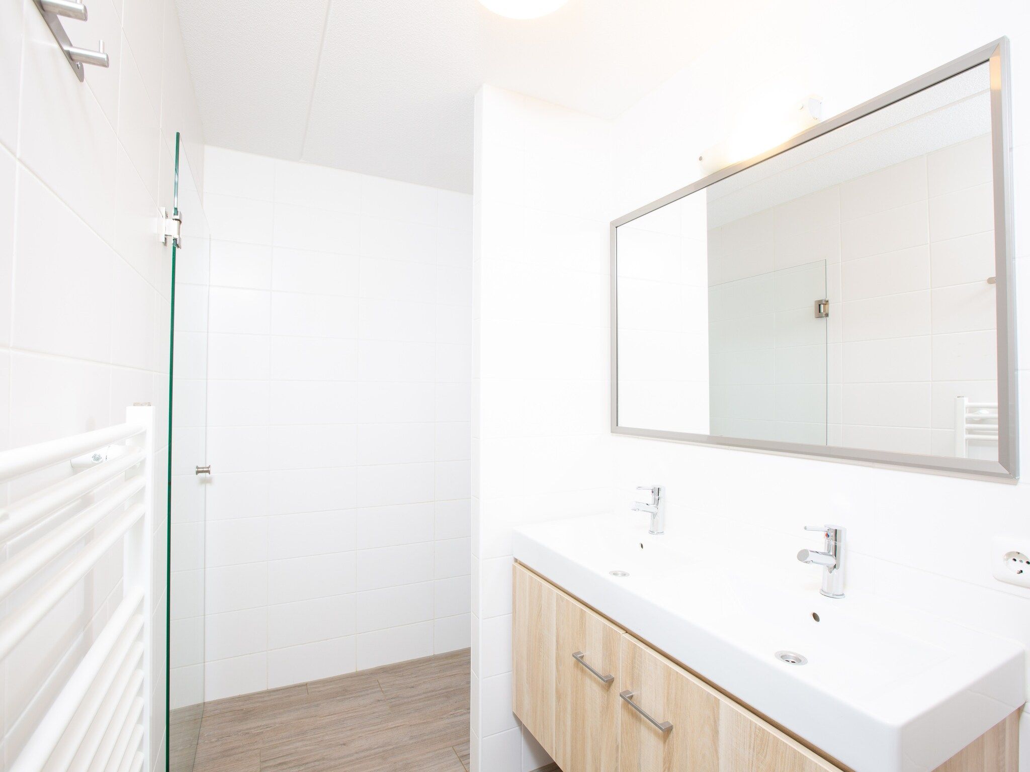 De badkamer van Strandpark Duynhille 2 in Ouddorp