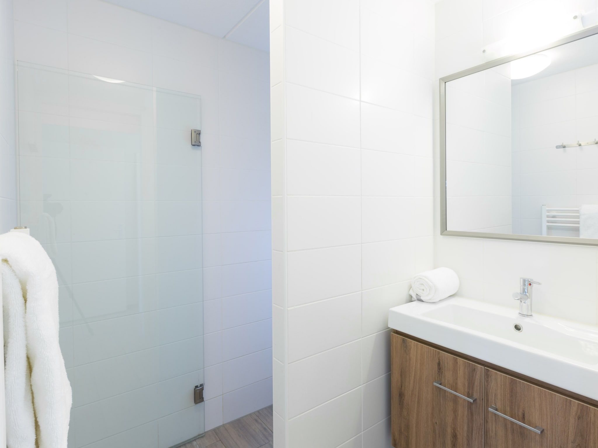 De badkamer van Strandpark Duynhille 4 in Ouddorp