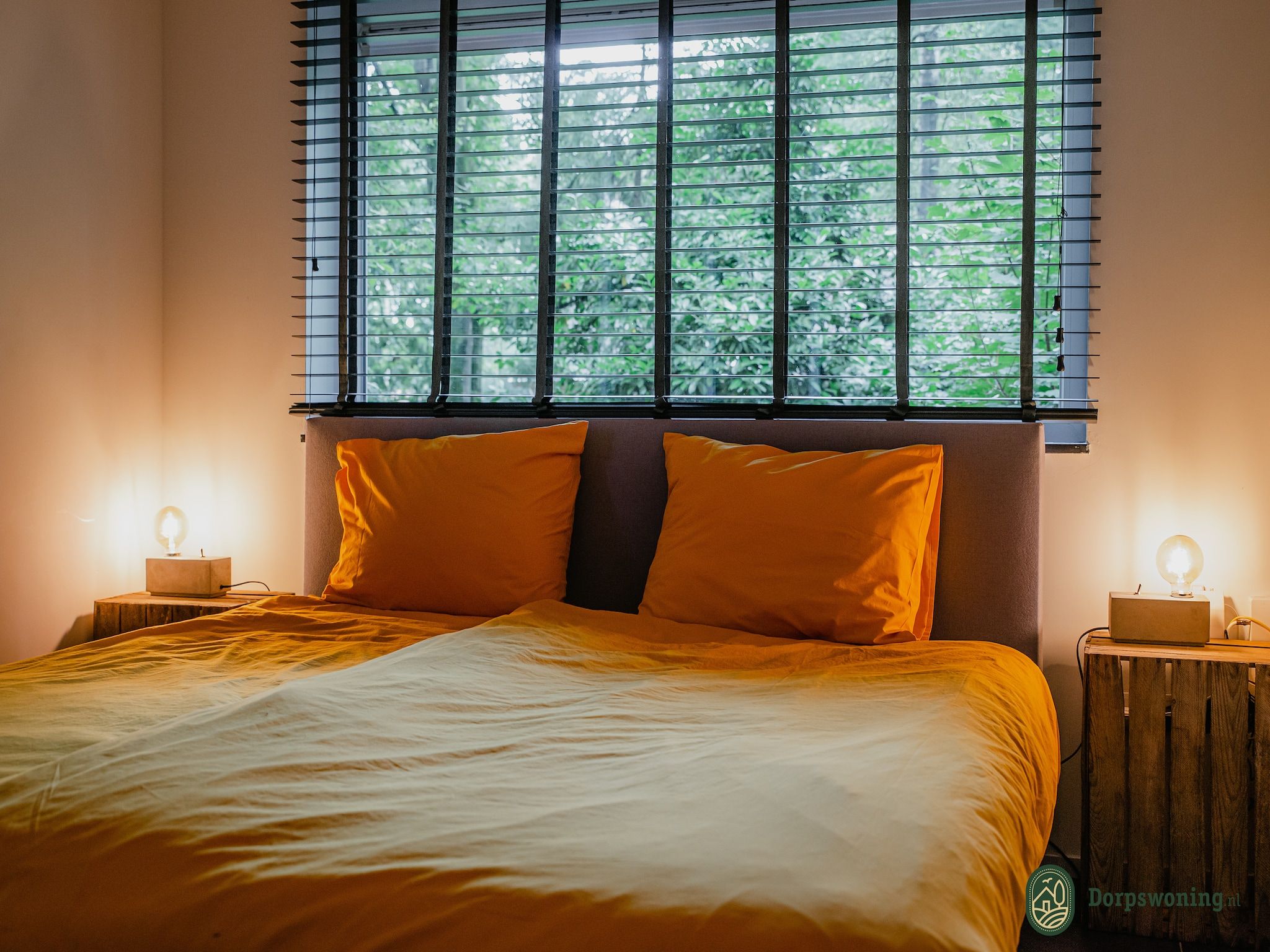 Een slaapkamer van Dorpswoning In het Bos in Leende