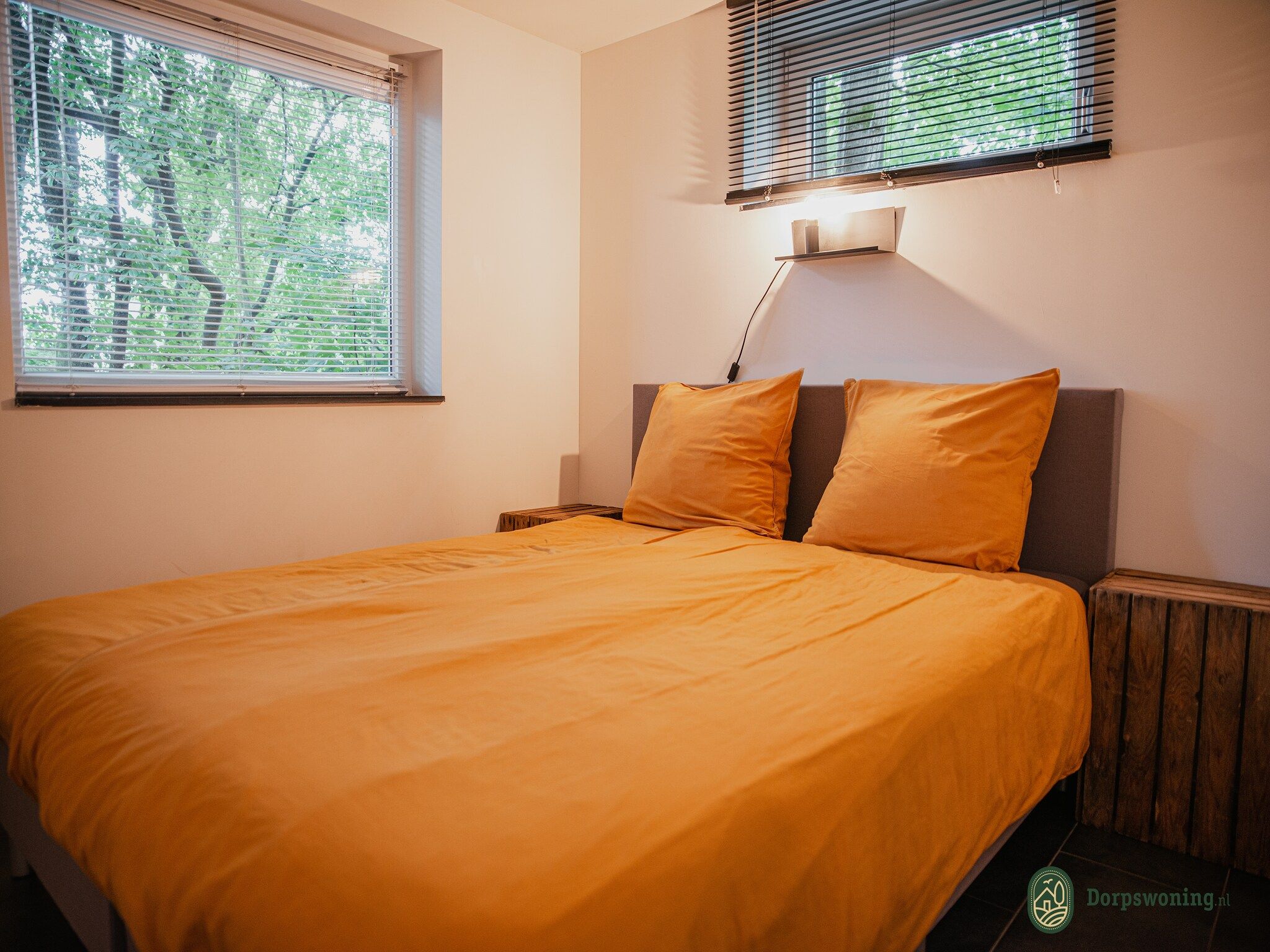 Een slaapkamer van Dorpswoning In het Bos in Leende