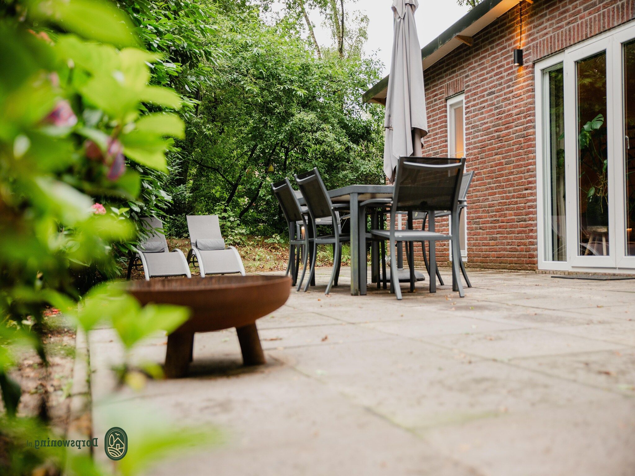 Het terras van Dorpswoning In het Bos in Leende