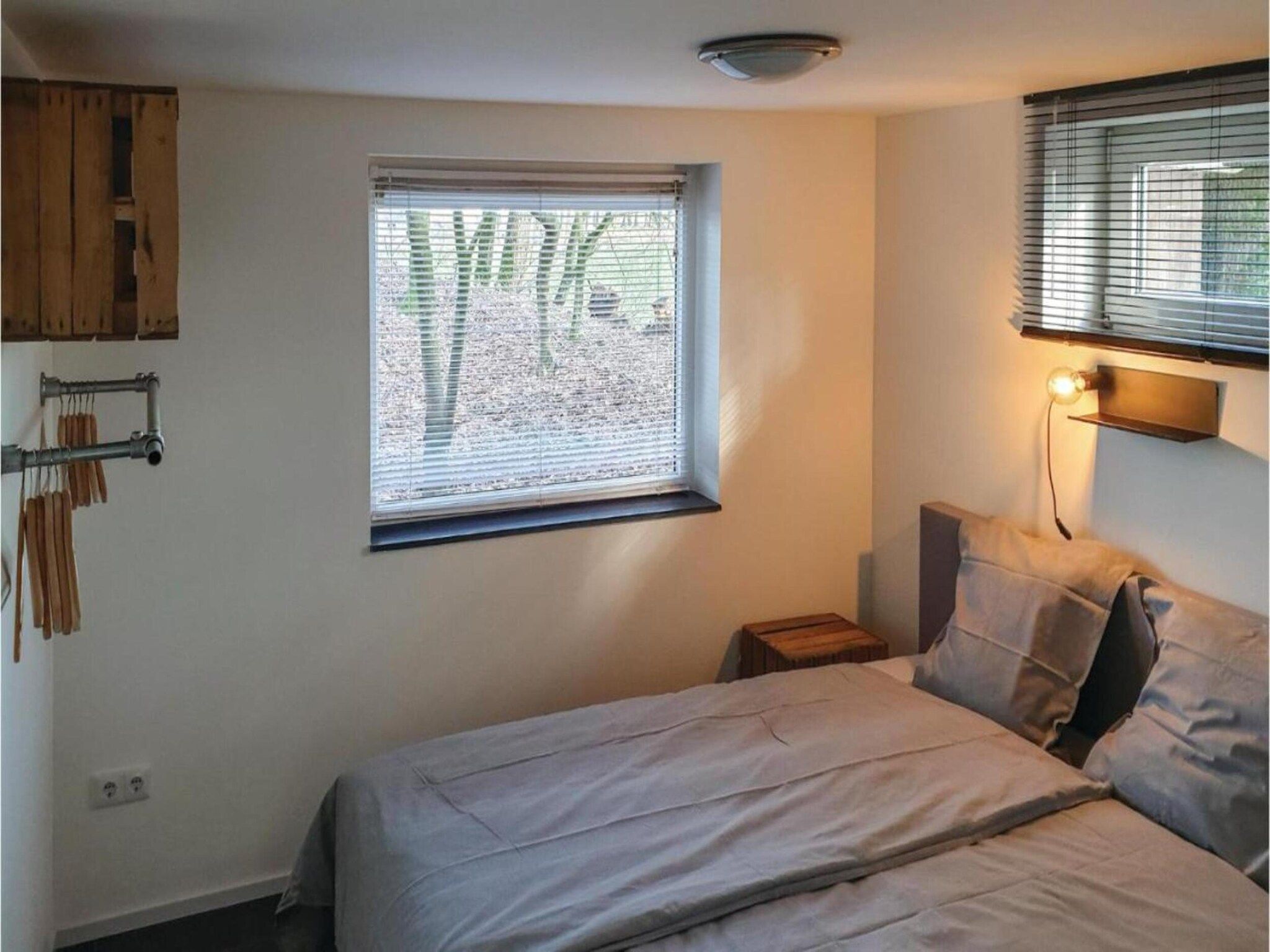 Een slaapkamer van Dorpswoning In het Bos in Leende