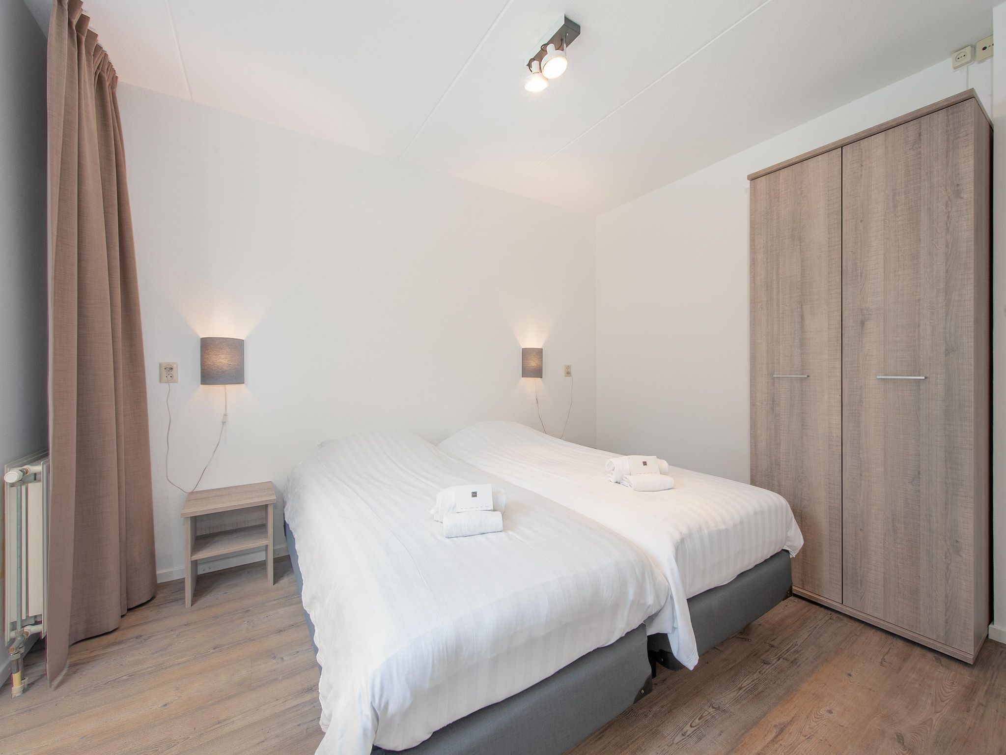 Een slaapkamer van Vakantiepark de Soeten Haert 19 in Renesse