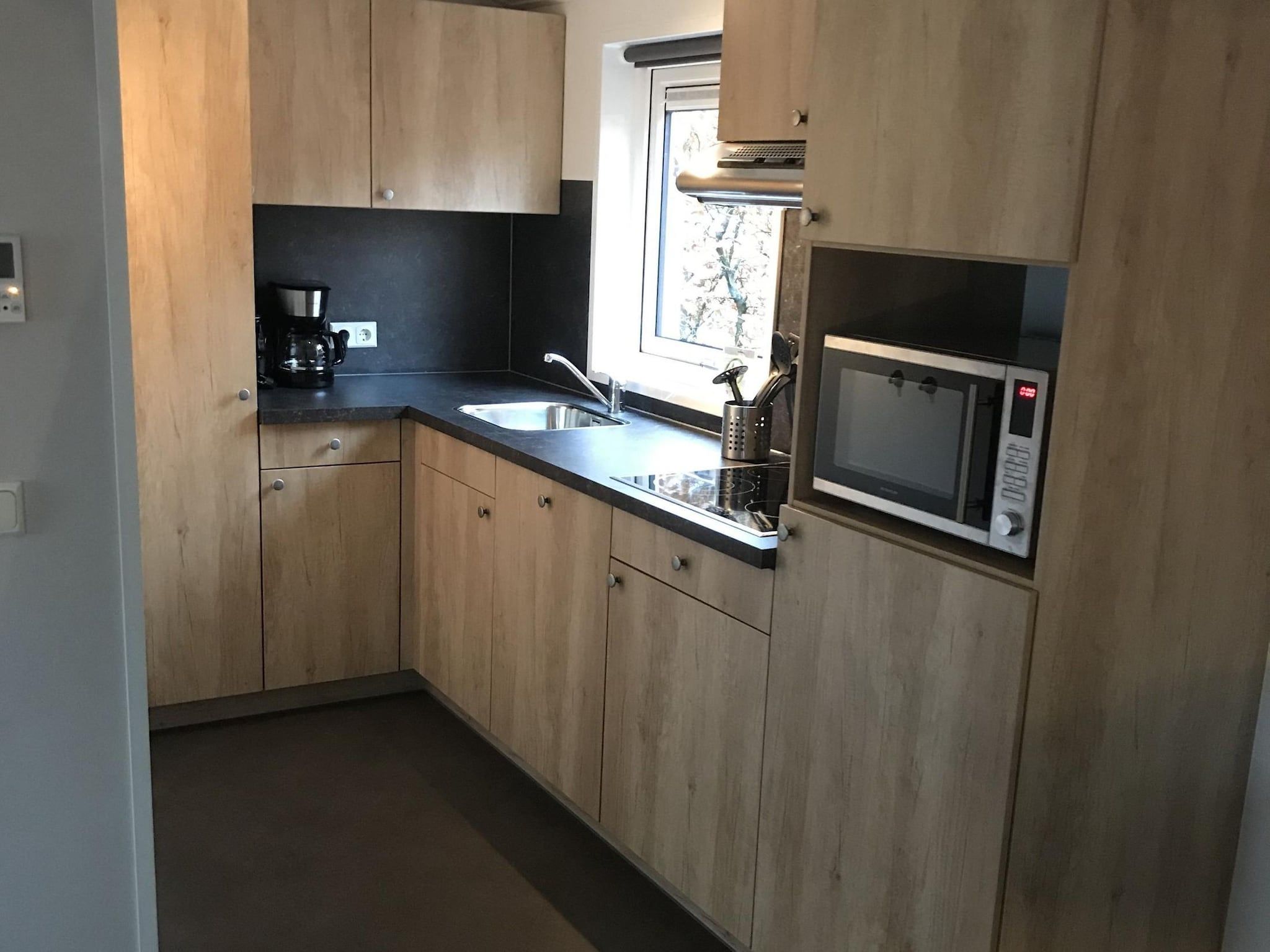 De keuken van Vakantiepark de Tabaksschuur 3 in Elst