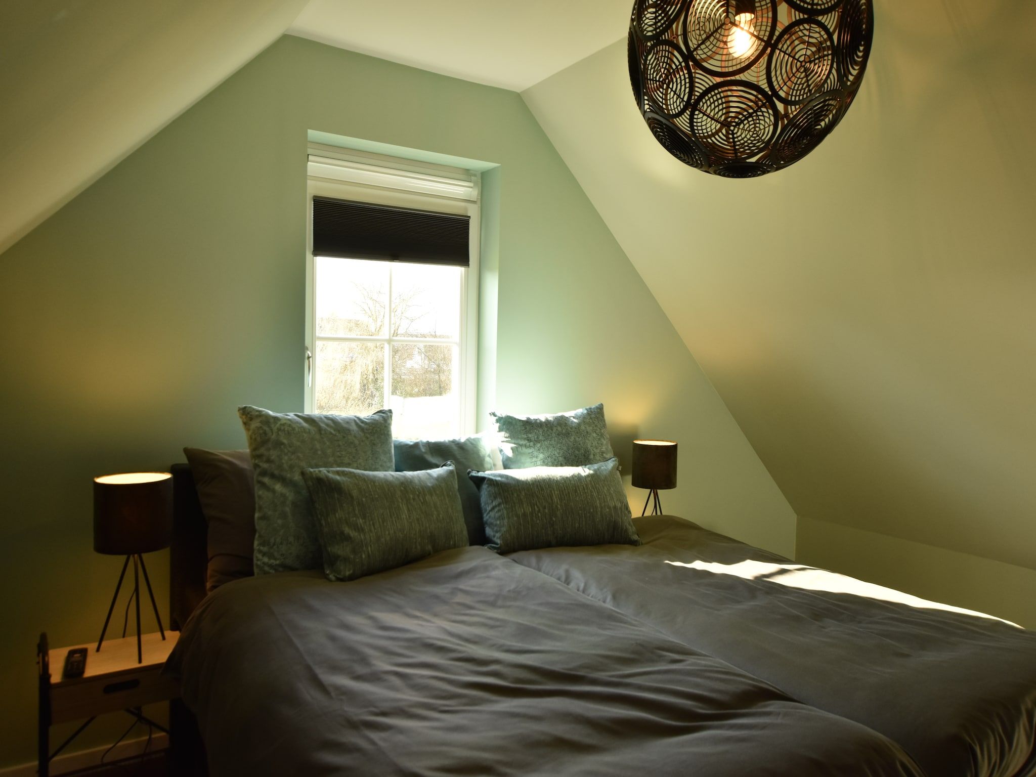 Een slaapkamer van Scoreldame XL in Schoorldam