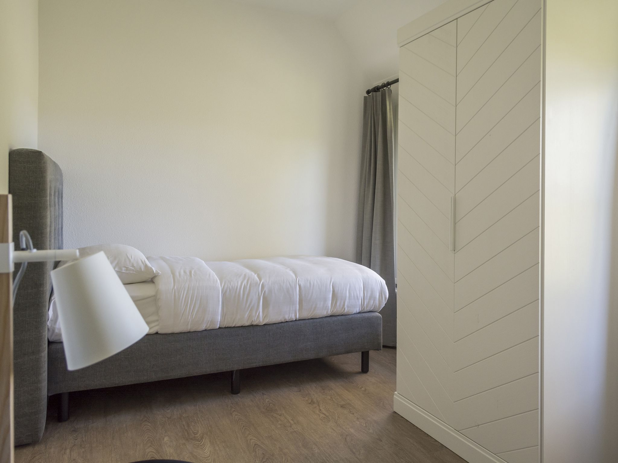 Een slaapkamer van Bouwlust G13 in De Cocksdorp Texel