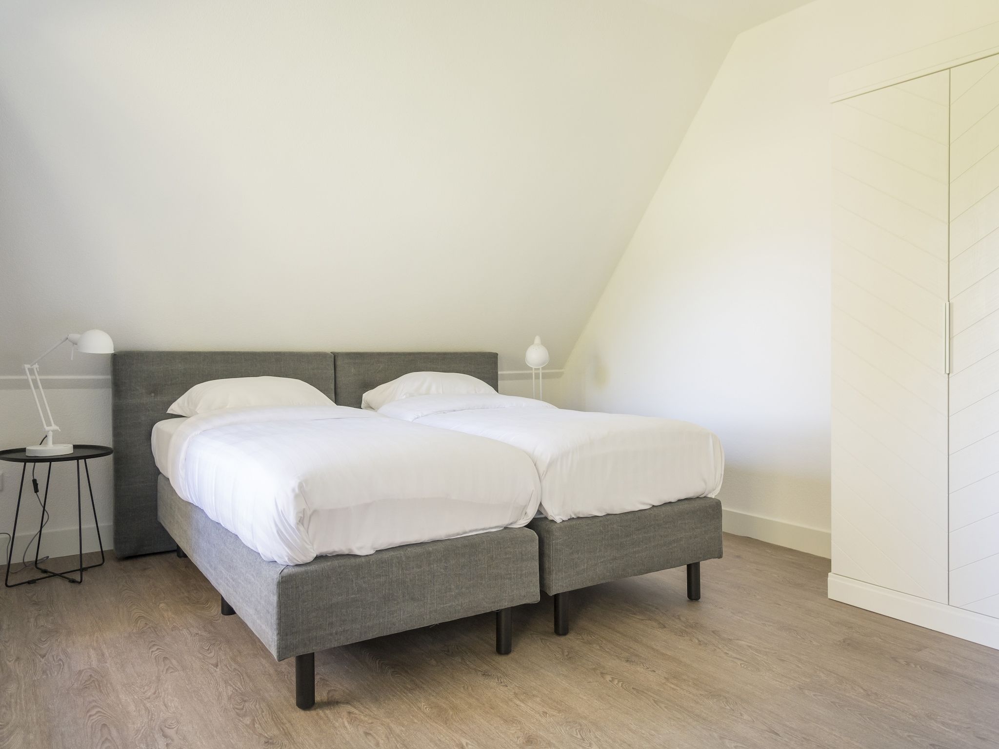 Een slaapkamer van Bouwlust G13 in De Cocksdorp Texel