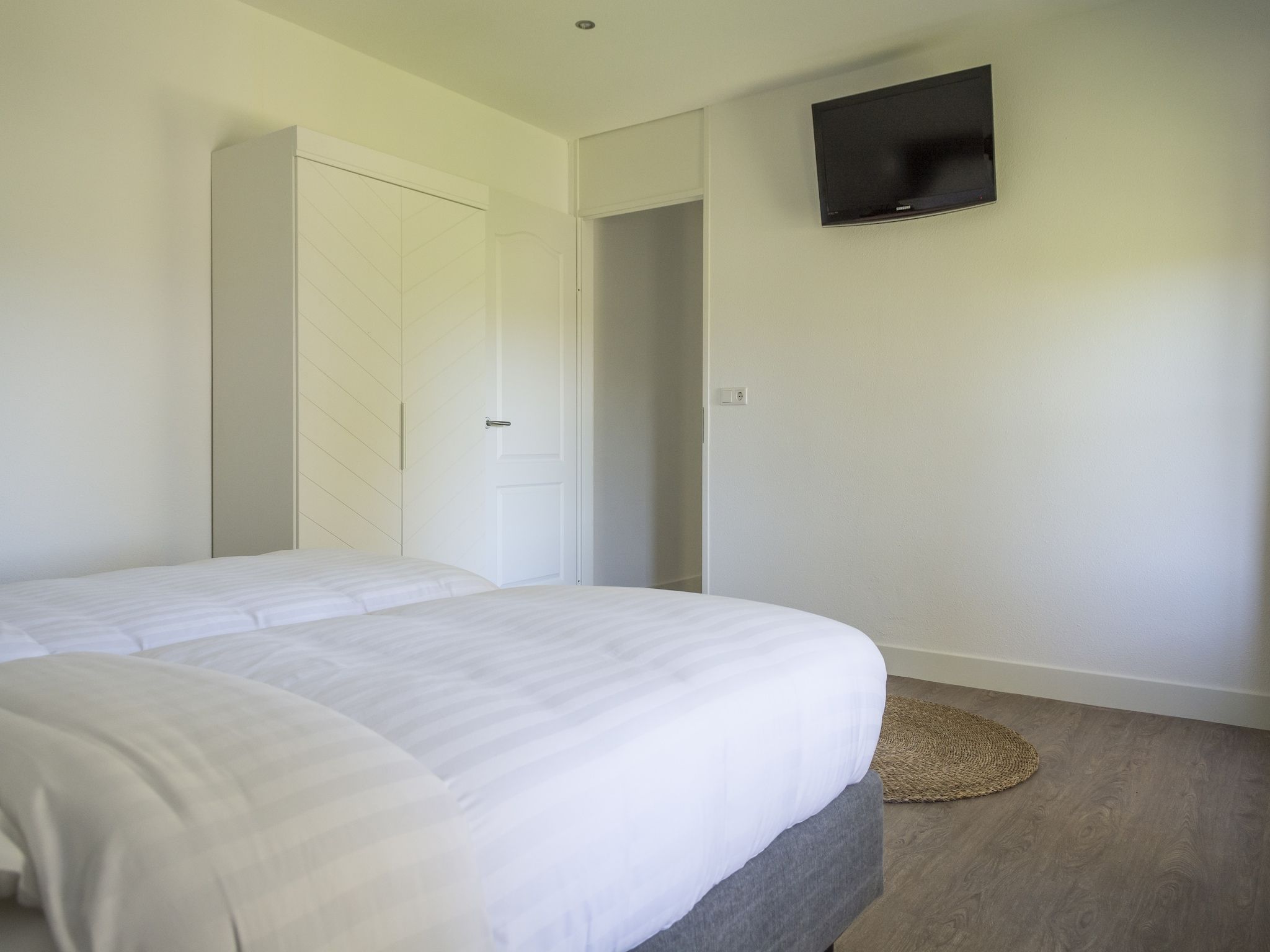 Een slaapkamer van Bouwlust G13 in De Cocksdorp Texel