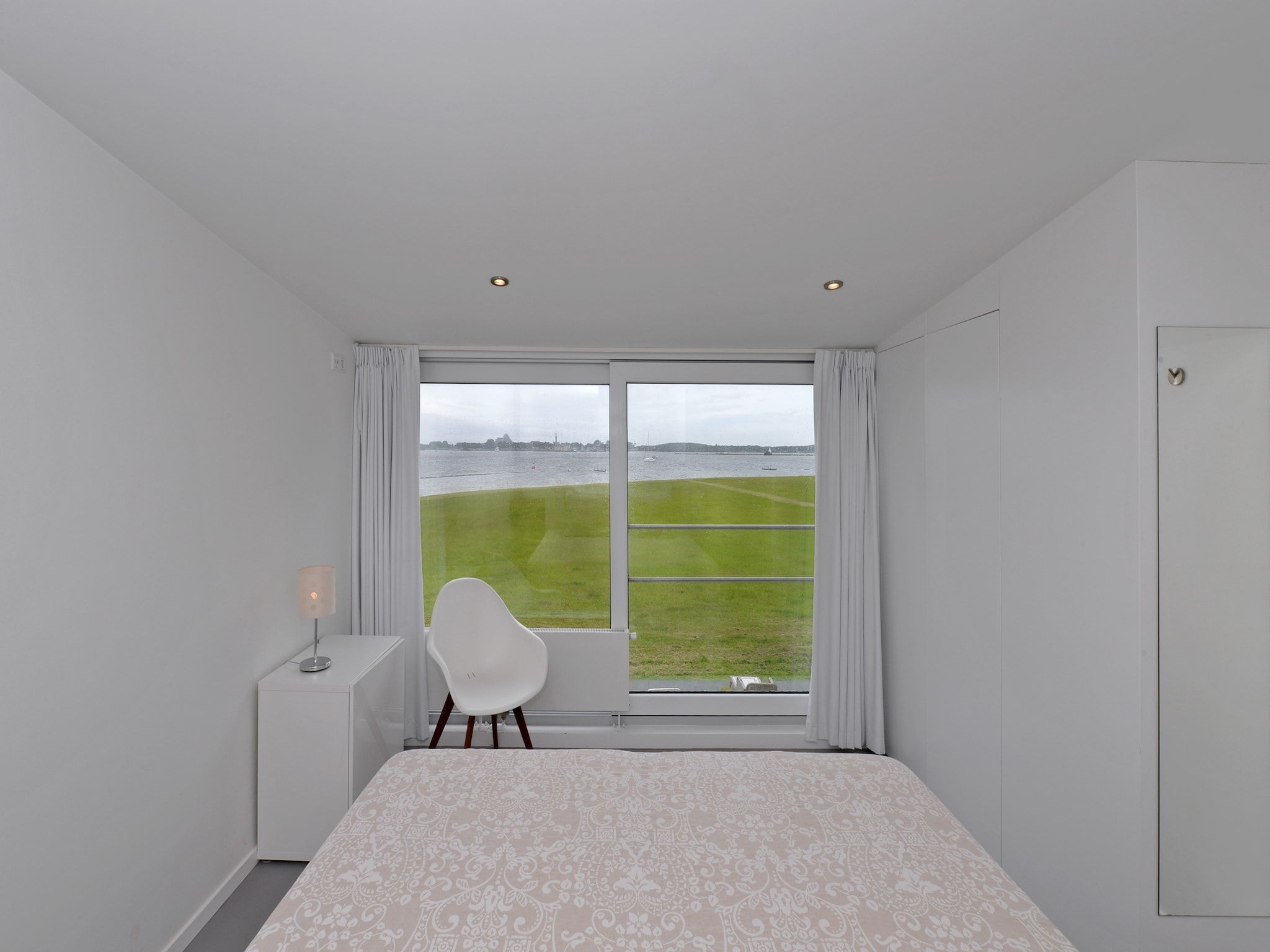 Een slaapkamer van Havenweg 12 in Kamperland