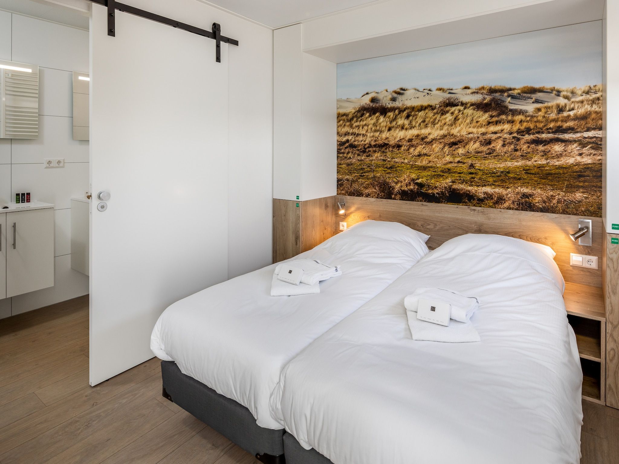 Een slaapkamer van Water Village 1 in Kamperland