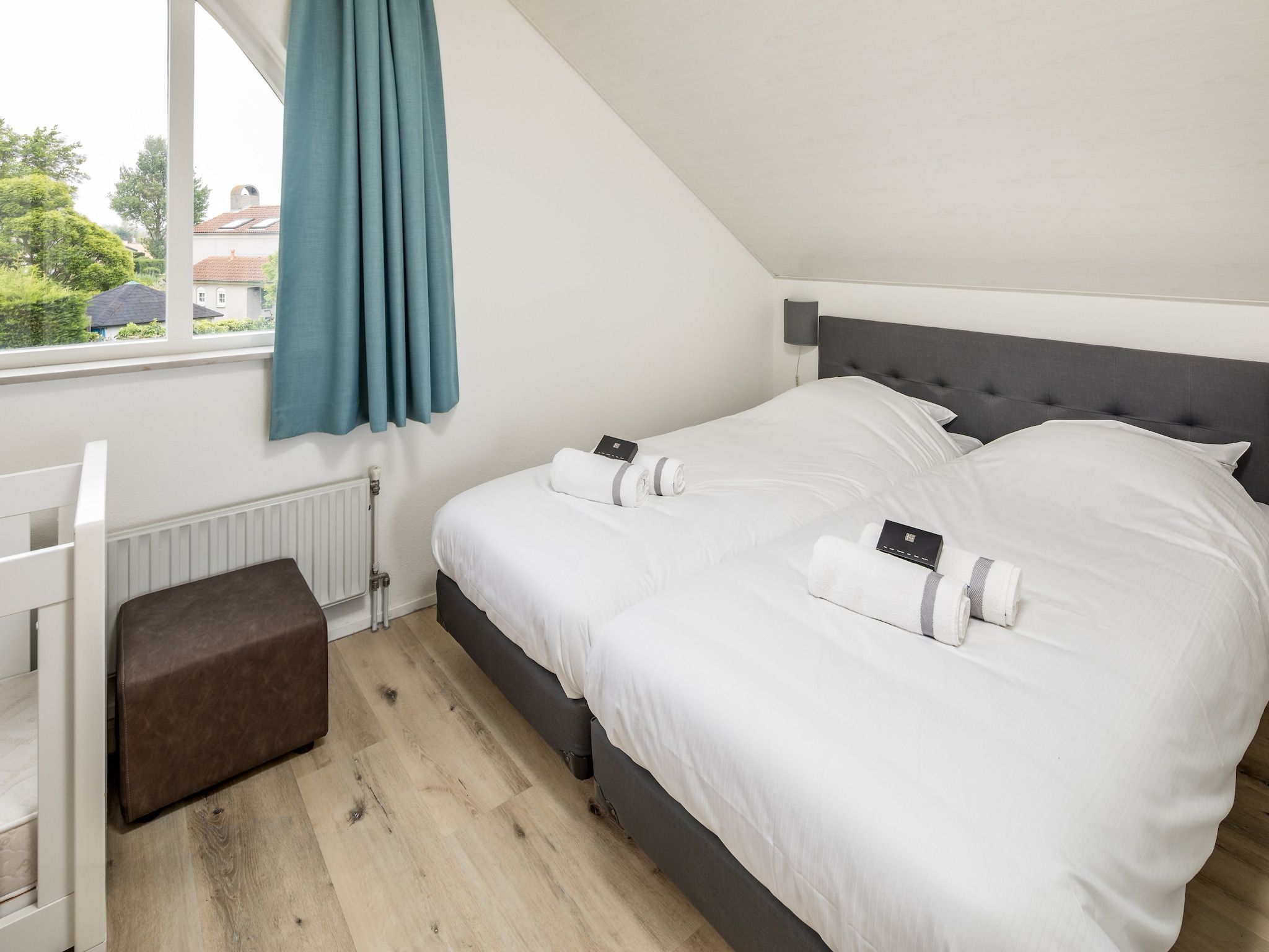 Een slaapkamer van Vakantiepark Zeebad 9 in Breskens