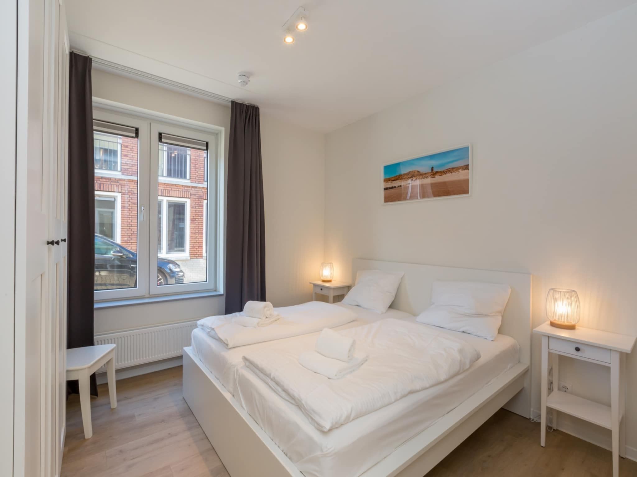 Een slaapkamer van Aparthotel Zoutelande - 5 pers luxe appartement in Zoutelande
