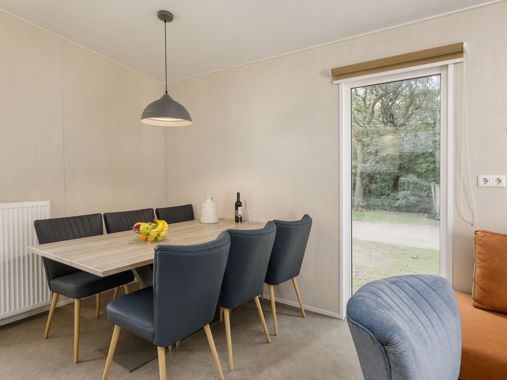 De woonkamer van Vakantiepark Kijkduin 11 in Den Haag