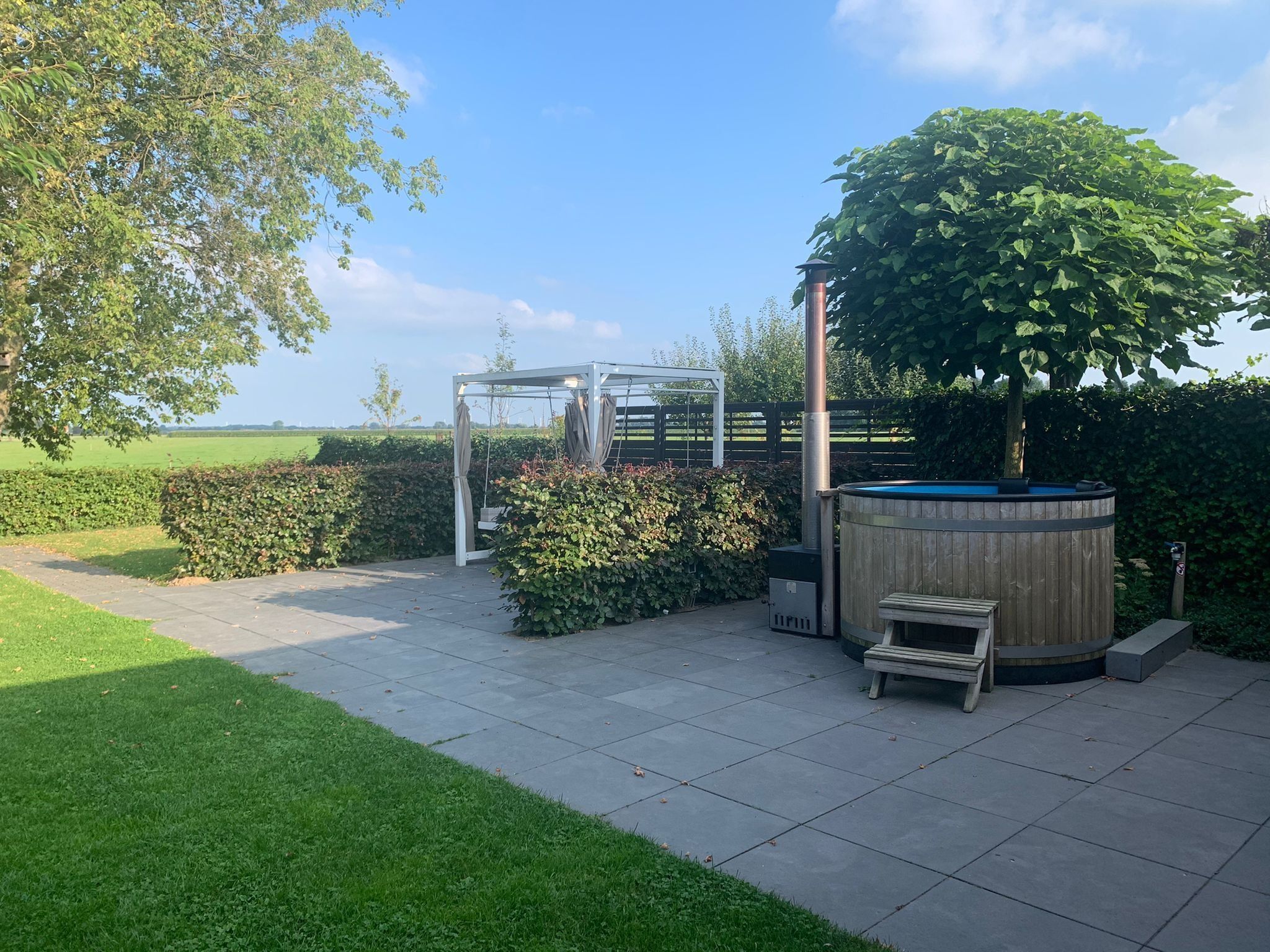 De tuin van Villa Grenszicht in Megchelen