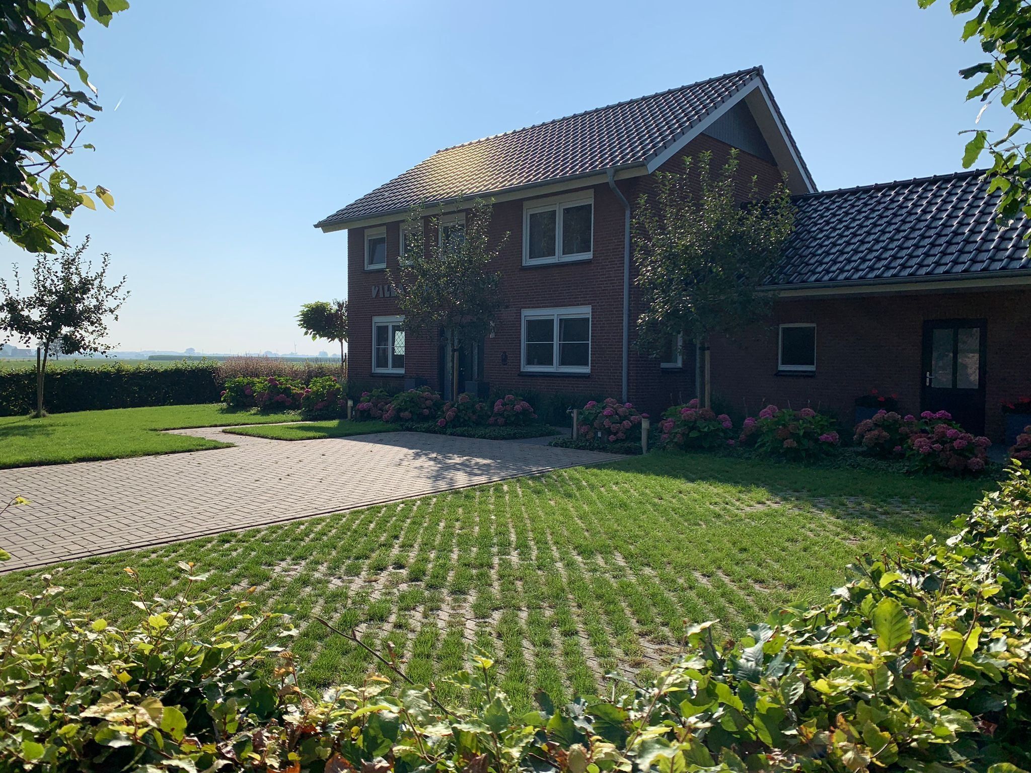 De buitenkant van Villa Grenszicht in Megchelen