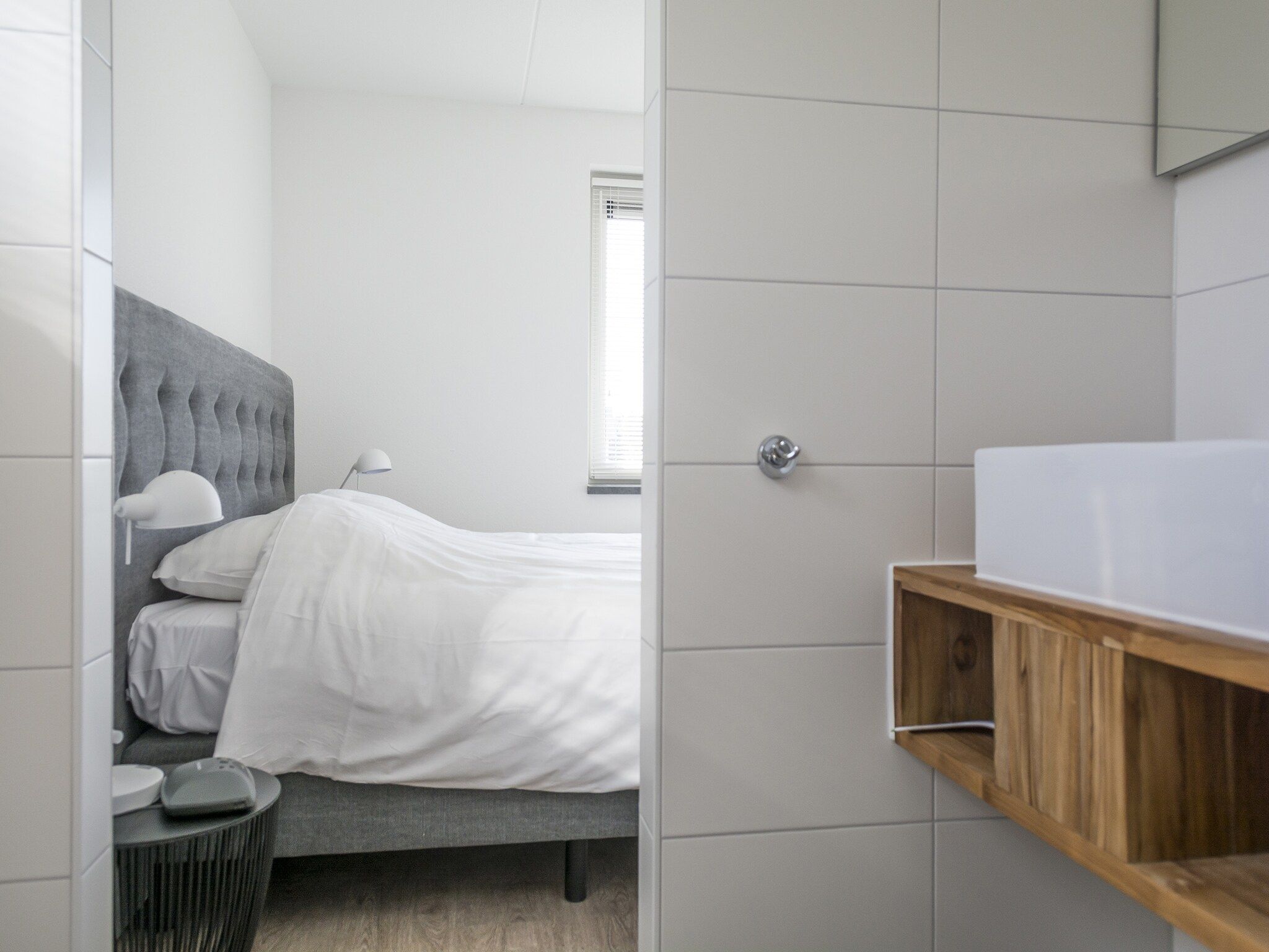 Een slaapkamer van Landhuis Bouwlust K in De Cocksdorp Texel