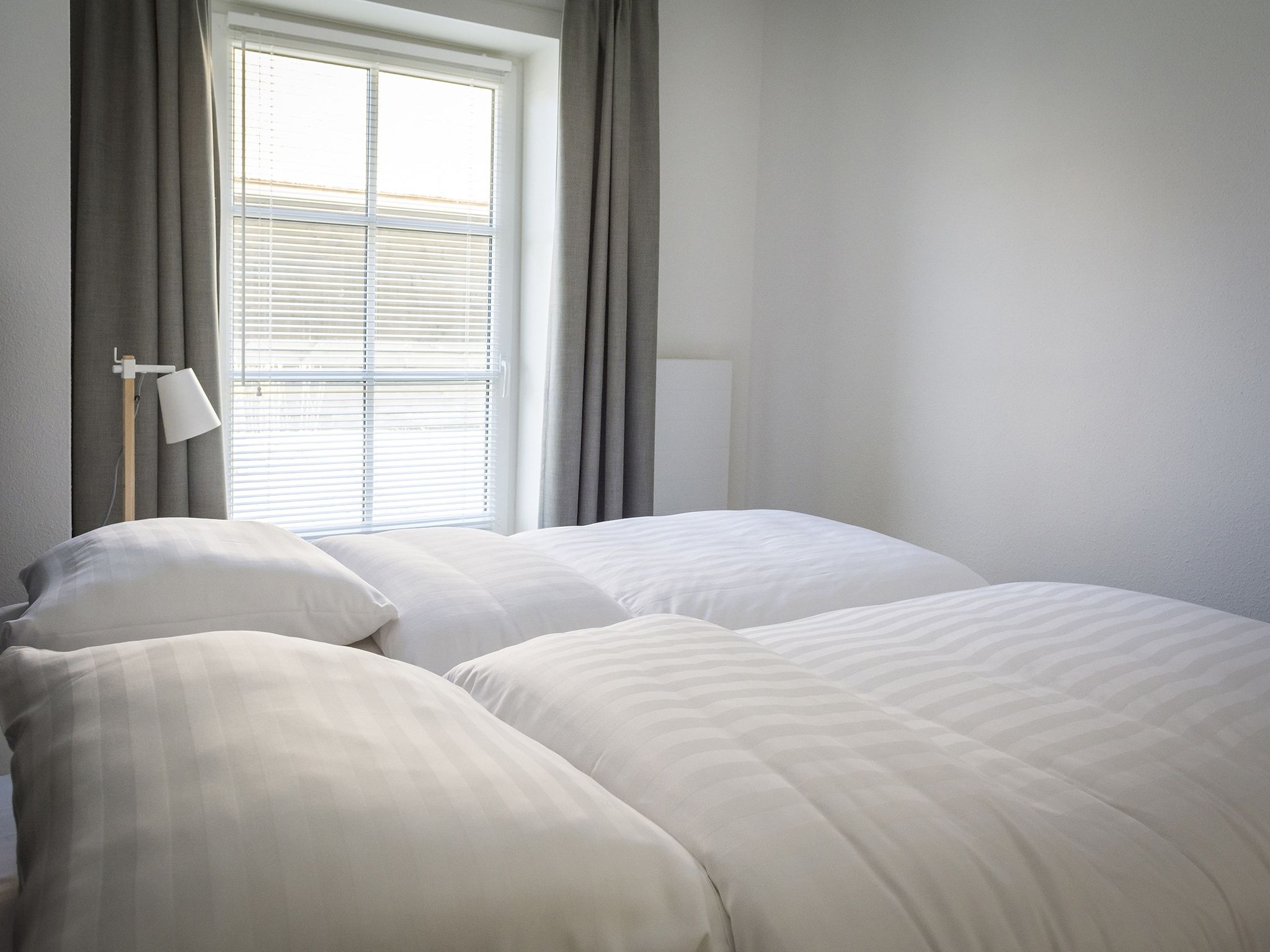 Een slaapkamer van Bouwlust G21A in De Cocksdorp - Texel