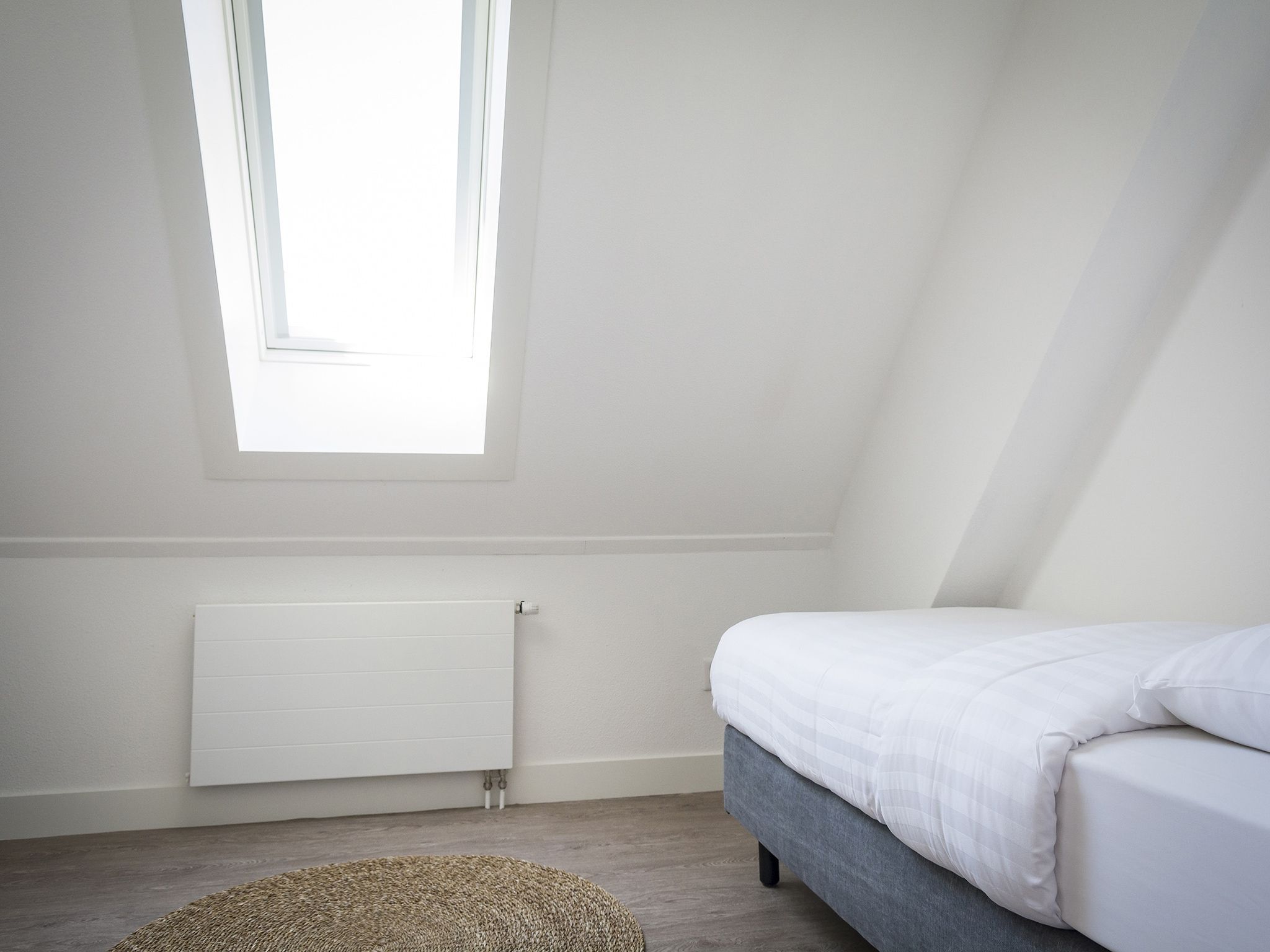 Een slaapkamer van Bouwlust G21A in De Cocksdorp - Texel