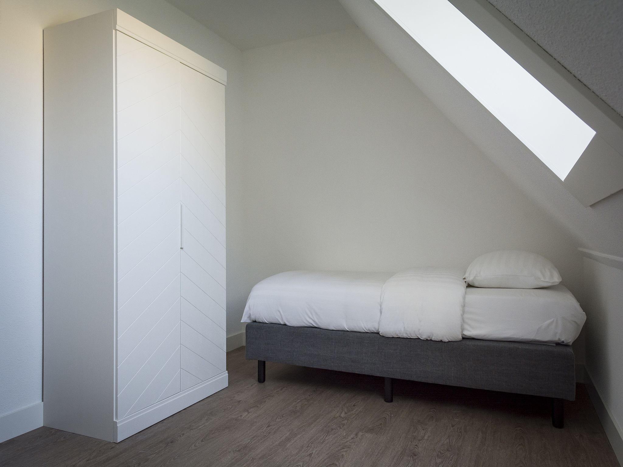 Een slaapkamer van Bouwlust G21A in De Cocksdorp - Texel