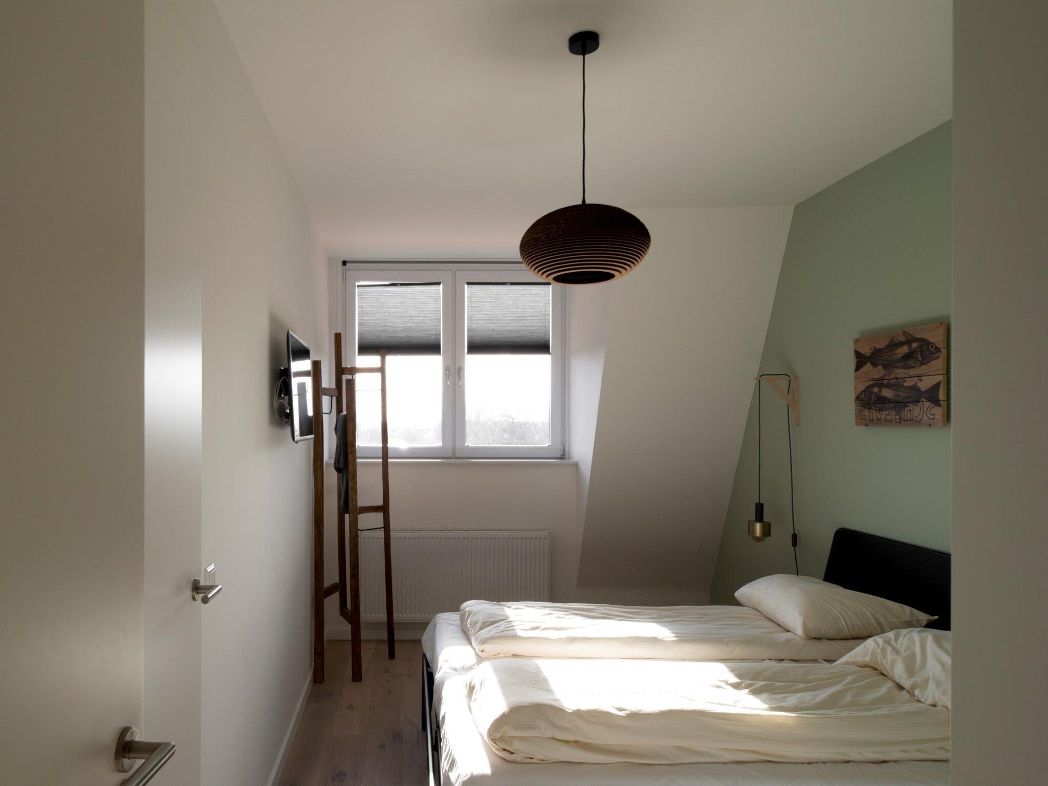 Een slaapkamer van Penthouse Duinhof in Cadzand-Bad