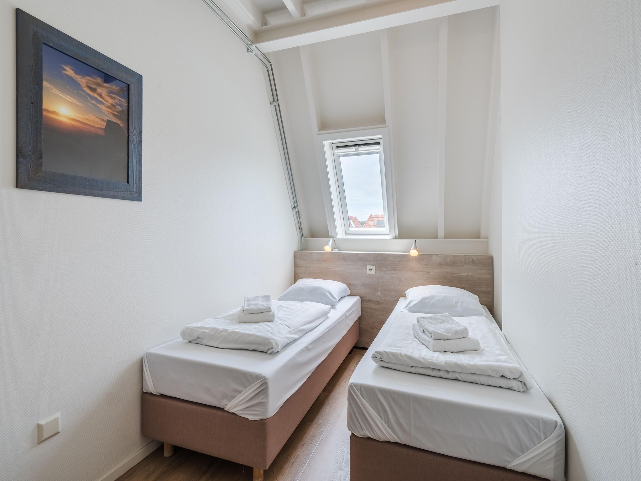 Een slaapkamer van Bosch en Zee 1 in De Koog Texel