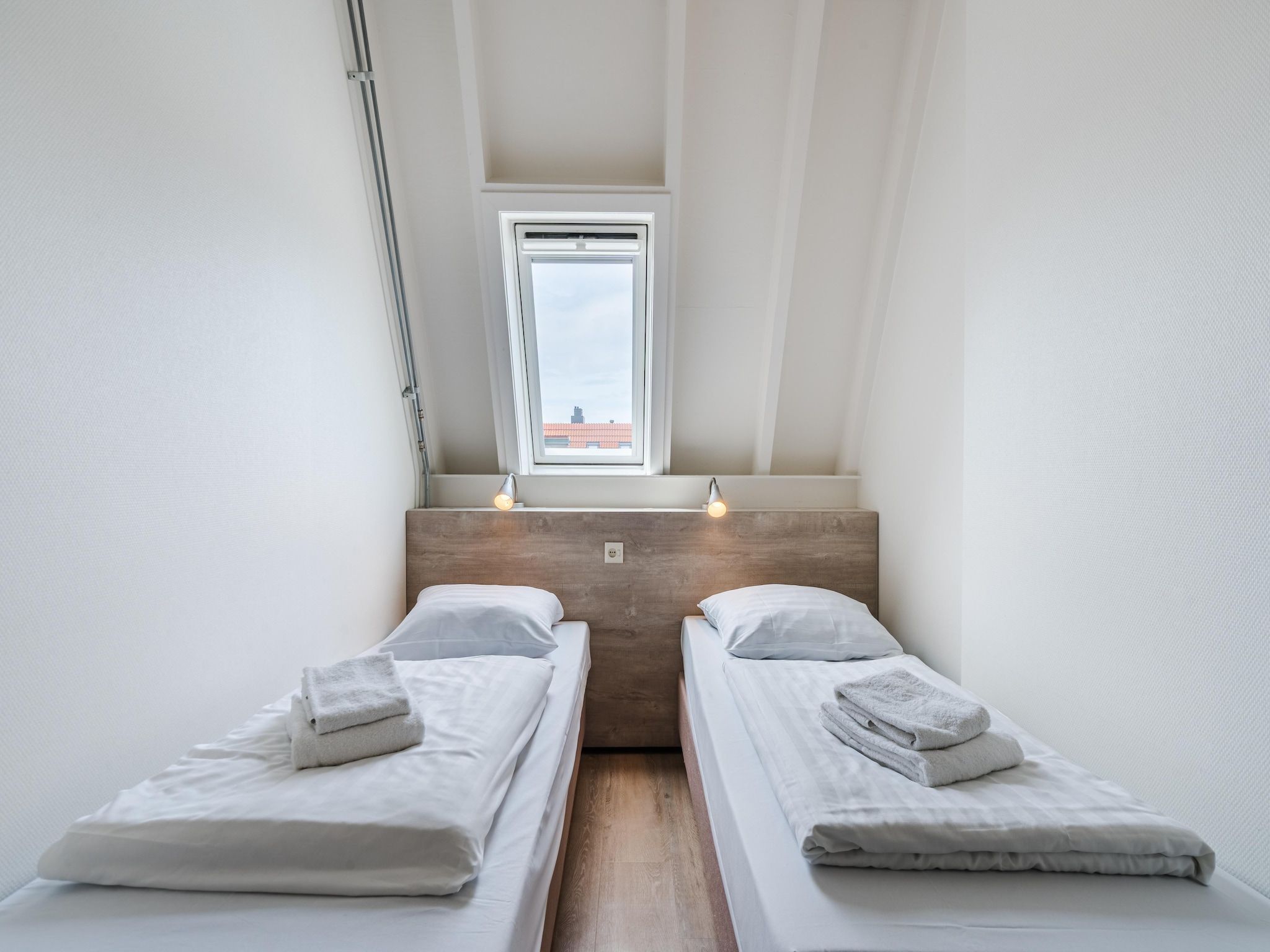 Een slaapkamer van Bosch en Zee 1 in De Koog Texel